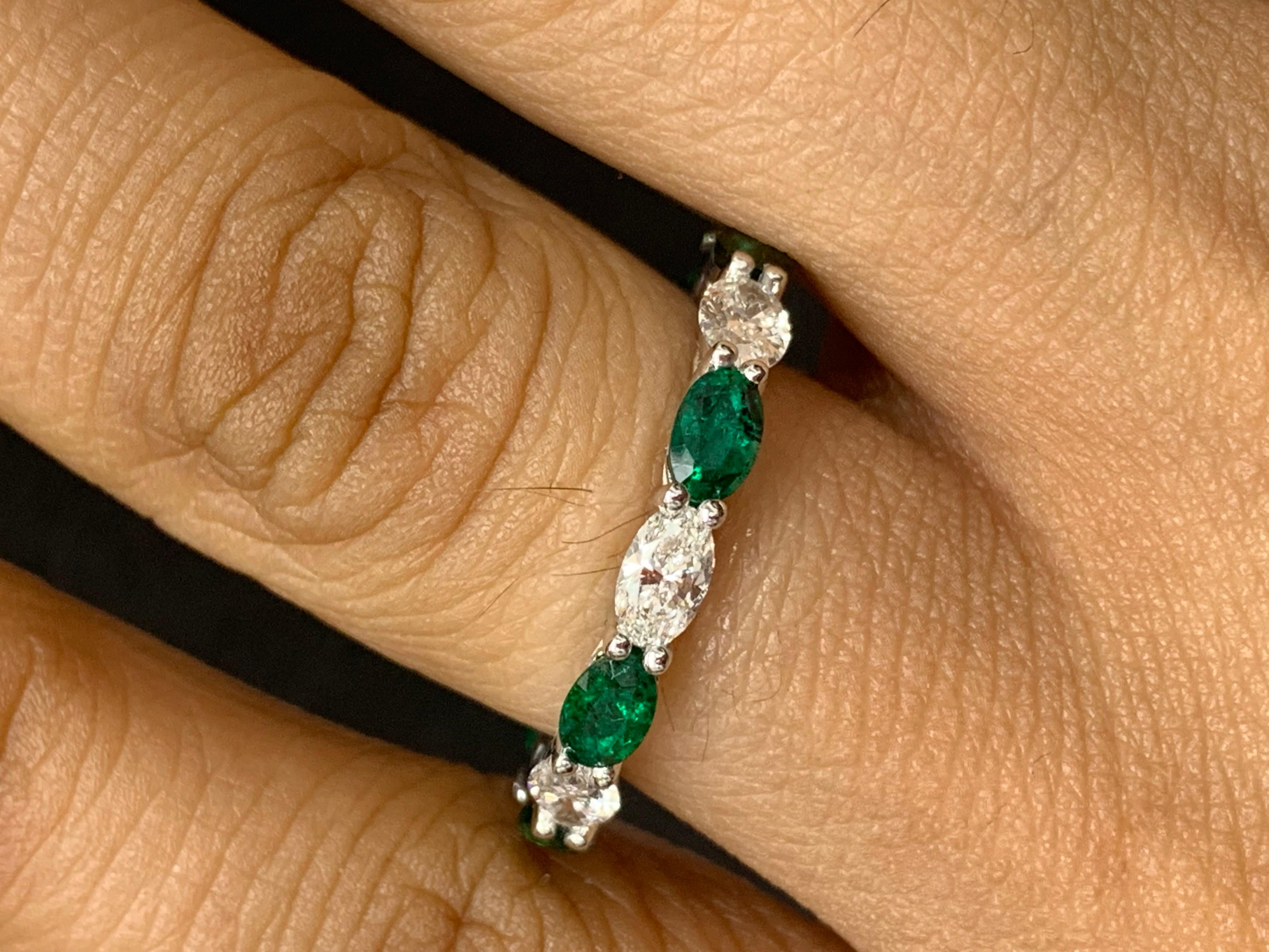 Handcrafted to perfection; showcasing color-rich oval cut emeralds that elegantly alternate brilliant oval cut diamonds in a 14k white gold setting. 
The 7 Emeralds weigh 1.64 carats total and 7 diamonds weigh 1.41 carats total.

Size 6.5 US