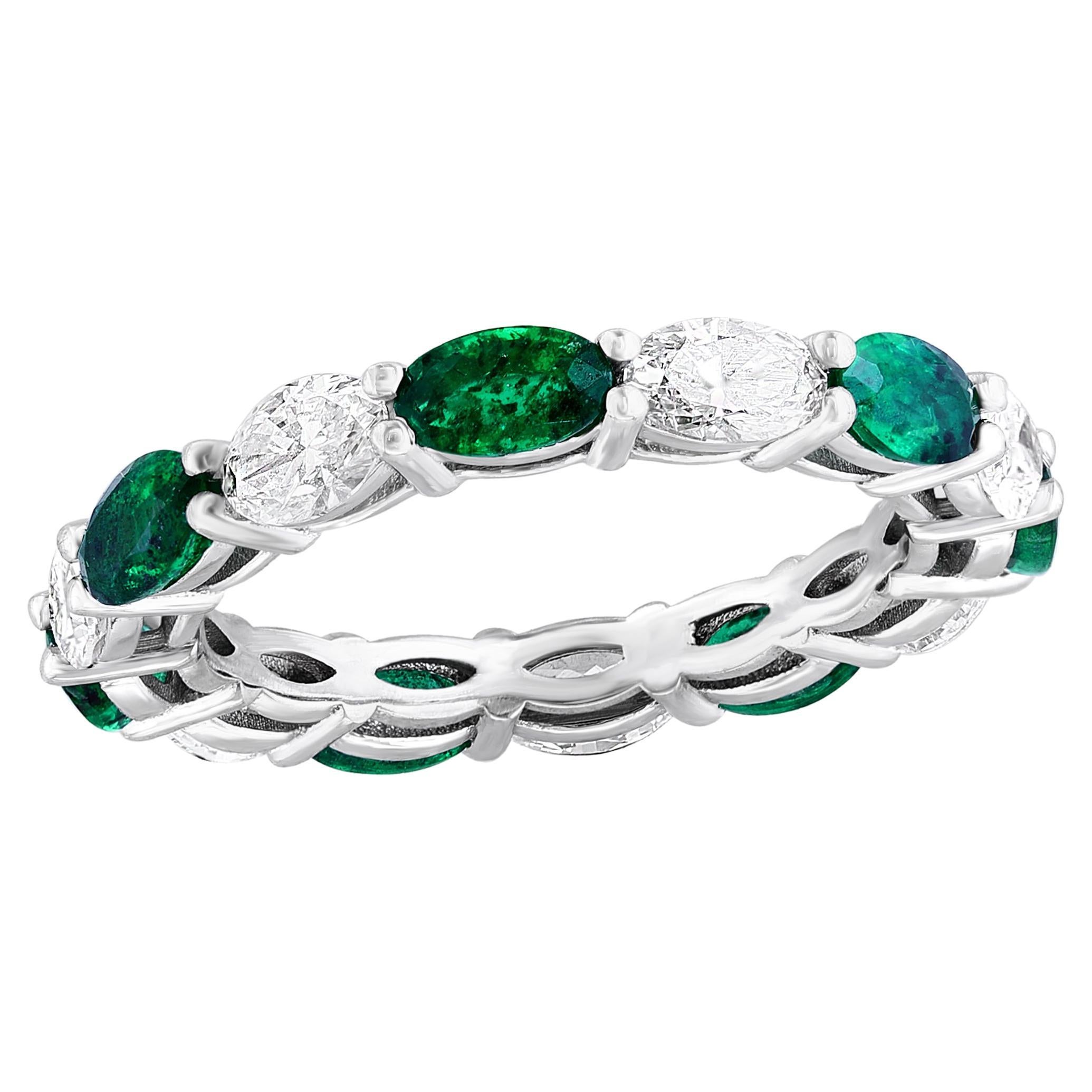 1.64 Carat Oval Cut Emerald and Diamond Eternity Band in 14K White Gold For Sale