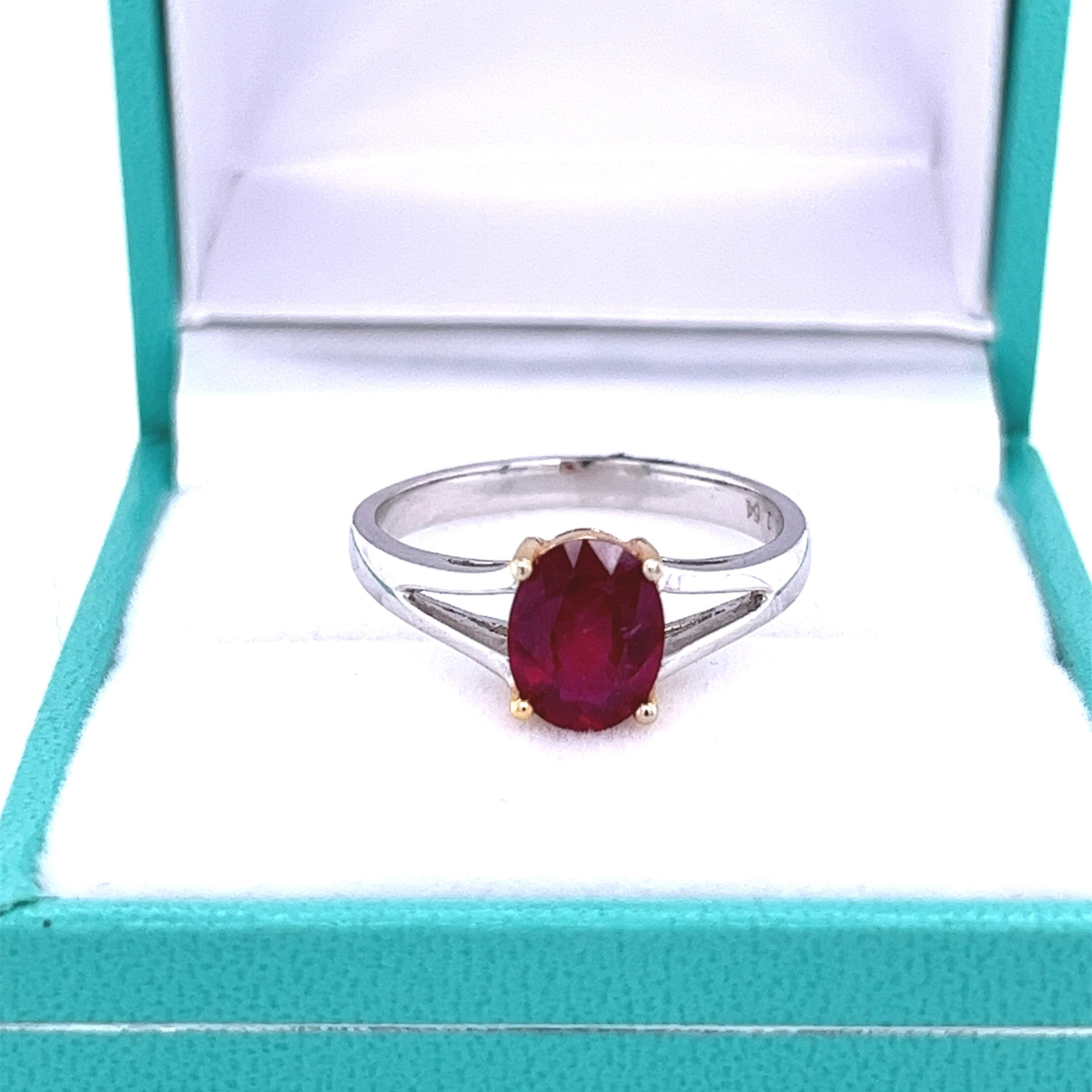 Natural 1.64 carat ruby set in 14 karat solid white and yellow gold ring. Hypoallergenic and waterproof. Ideal for daily wear.

Ring Details:
✔ Metal: 14K
✔ Weight: 2.7 grams
✔ Band Width: 2.5 mm
✔ Ring Size: 7 U.S. (adjustable)

Ruby Details:
✔