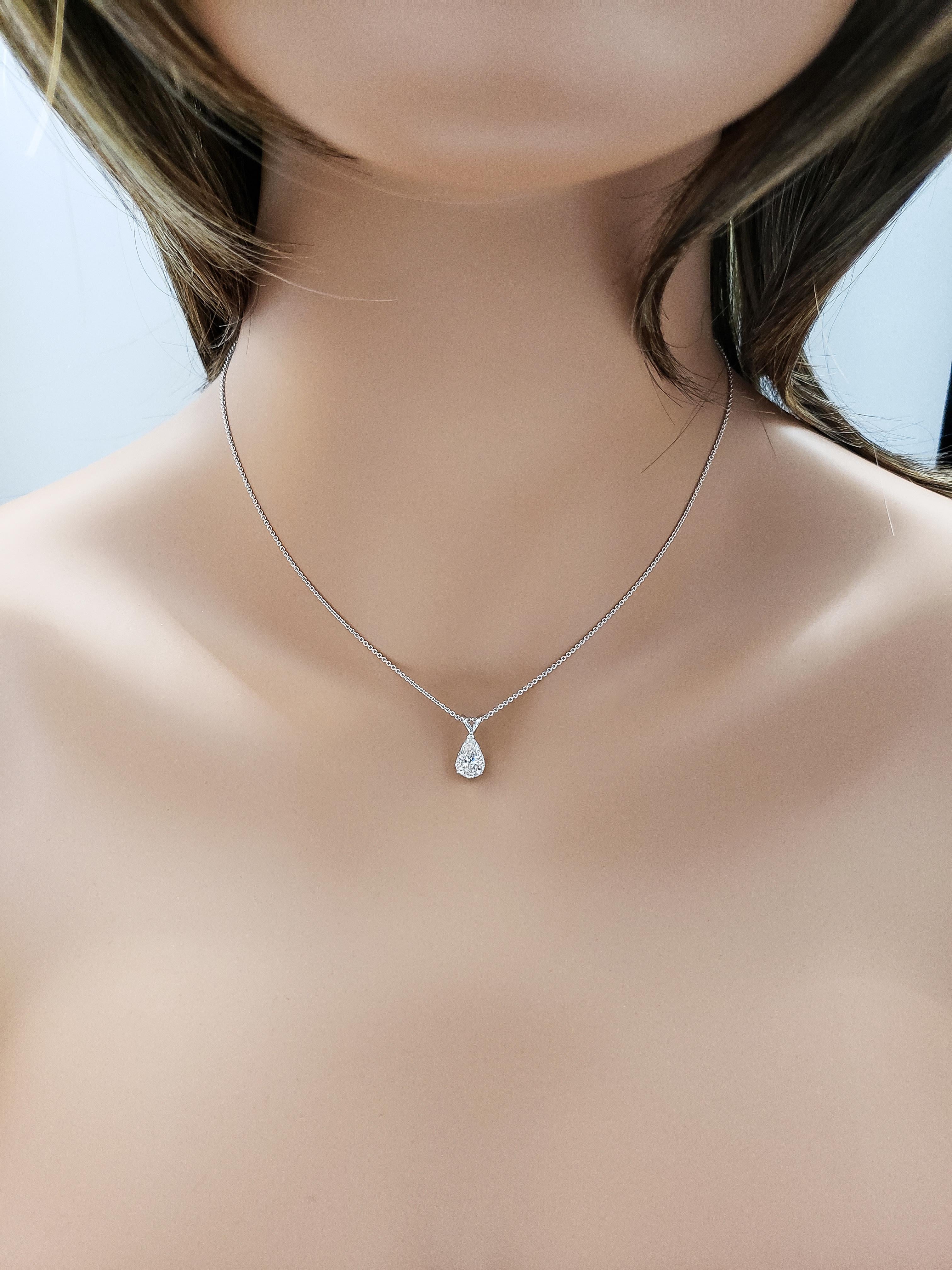 A gorgeous and colorless pear shape diamond weighing 1.64 carats, set in a 14 karat white gold mounting. Attached to a V-bale, suspended on an 18 inch white gold chain (adjustable upon request).

Style available in different price ranges. Prices are