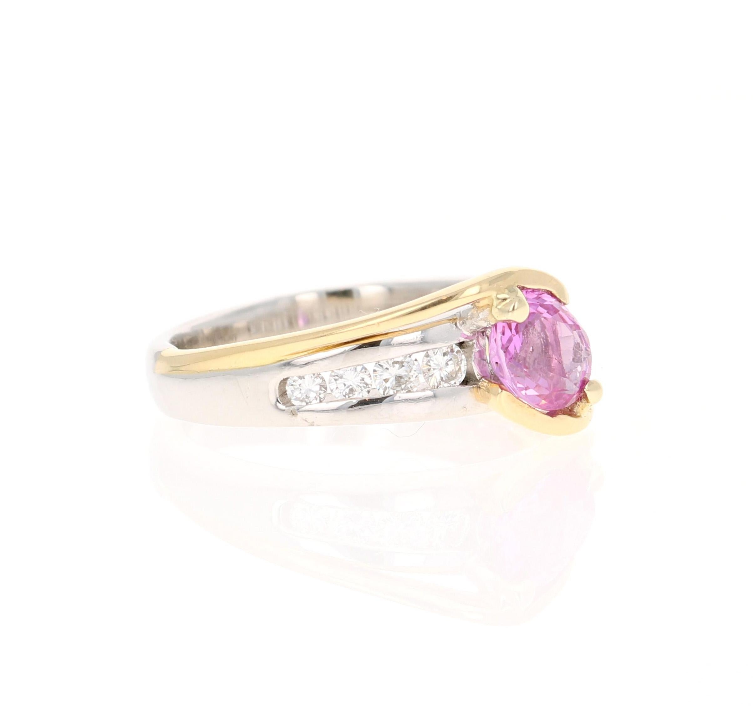 This beautiful ring has an Oval Cut Pink Sapphire that weighs 1.14 carats and has 8 Round Cut Diamonds that weigh 0.50 carats. (Clarity: VS, Color: F)
The total carat weight of the ring is 1.64 carats. 

The ring is beautifully set in 18 Karat Gold