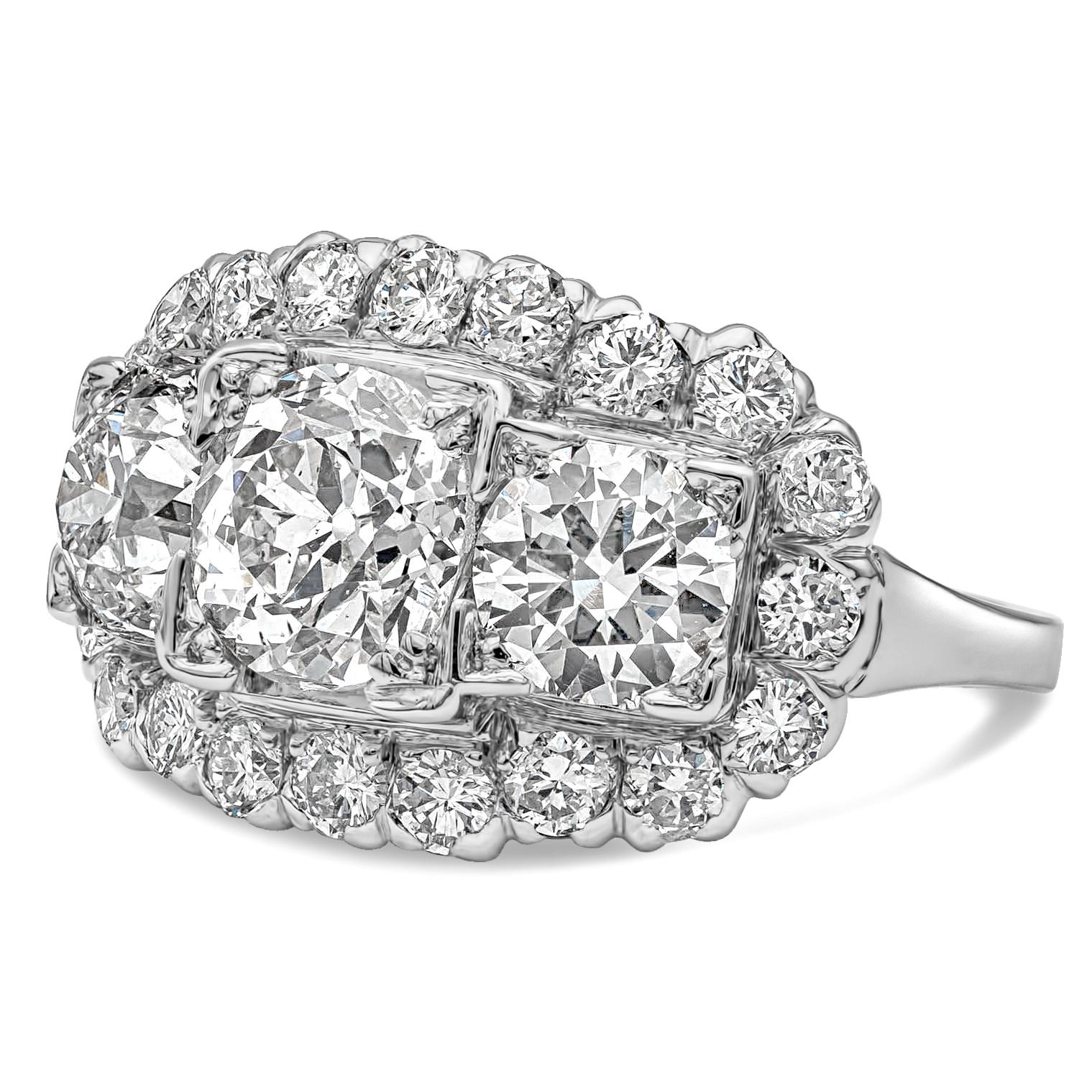 A charming antique engagement ring style showcasing a three stone design, features a Old European Cut diamond center stone weighing 1.64 carats total, flanked by brilliant round diamond on each side weighing 1.40 carats total. Accented by brilliant