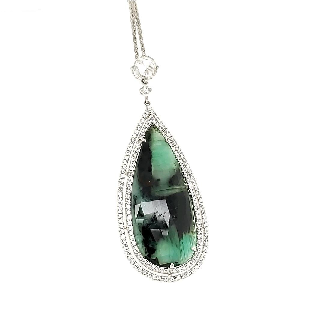 16.40 Carat Pear Shaped Emerald And White Diamond Pendant With White Gold Chain:

A magnificent and rare Pear Shaped Emerald weighing 16.40 carat, it forms a wonderful pendant with a White Rose Cut Diamond at the top weighing 0.49 carat. In