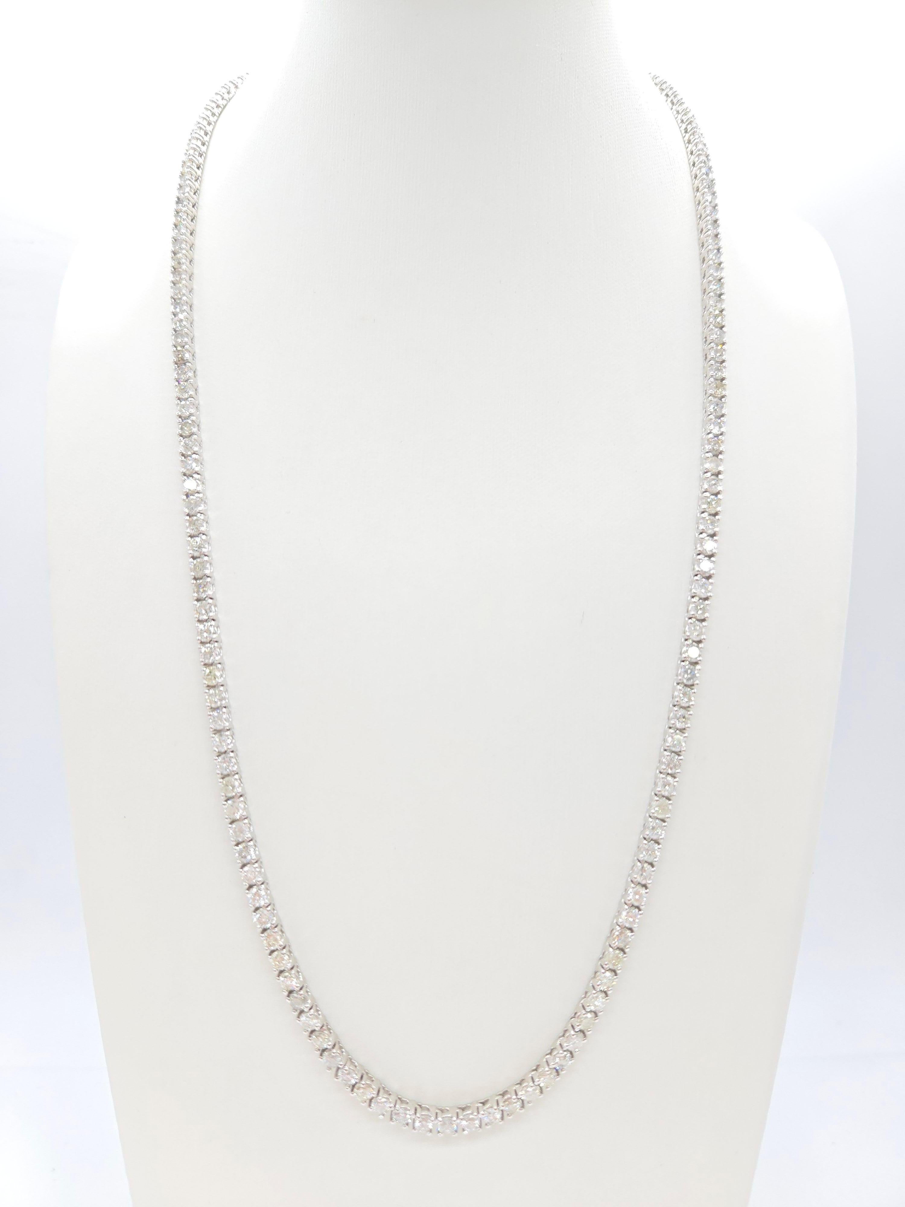 Elegant Tennis Necklace with Round-Brilliant Cut White Diamonds

This luxurious tennis necklace showcases round-brilliant cut white diamonds, renowned for their exceptional sparkle and brilliance. With a classic four-prong setting, the necklace