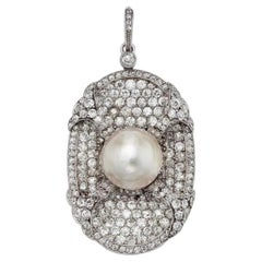 Ciondolo con perla naturale, diamante e platino da 16,401 carati