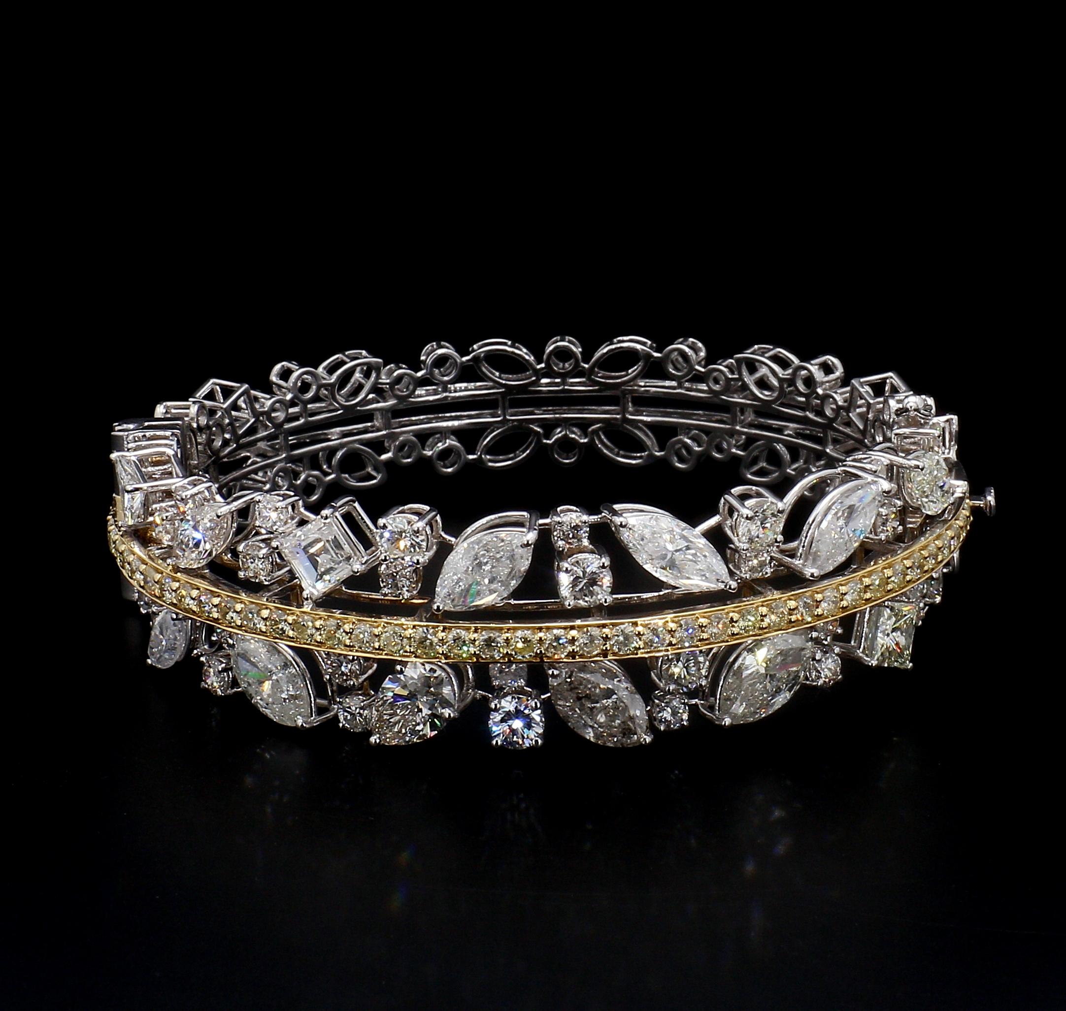 **Tous nos bijoux sont uniques et poinçonnés avec la pureté de l'or et le poids des diamants.
** dimensionné pour un poignet de 6 pouces**

Ce bracelet en diamants est un véritable chef-d'œuvre, affichant un poids total de 16,42 carats, dont 10,69