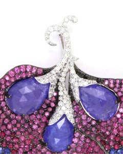 16.45 carats of tanzanite flower petals pendant
