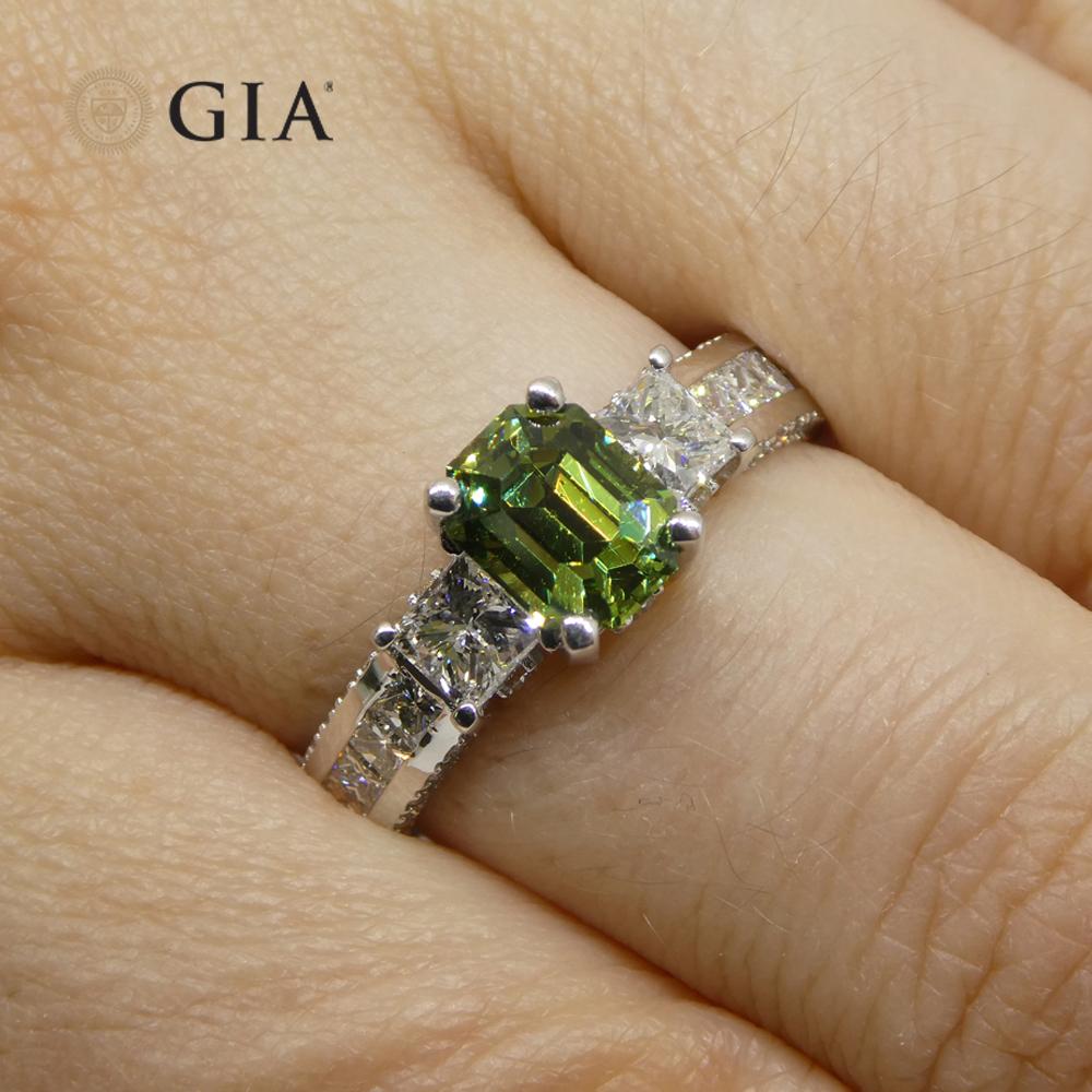 This distinctive 1.64ct Demantoid Garnet and Diamond ring, elegantly set in 14K White Gold, stands as a testament to Skyjems' three generations of commitment to quality and craftsmanship.



The central Demantoid Garnet, known for its vibrant green