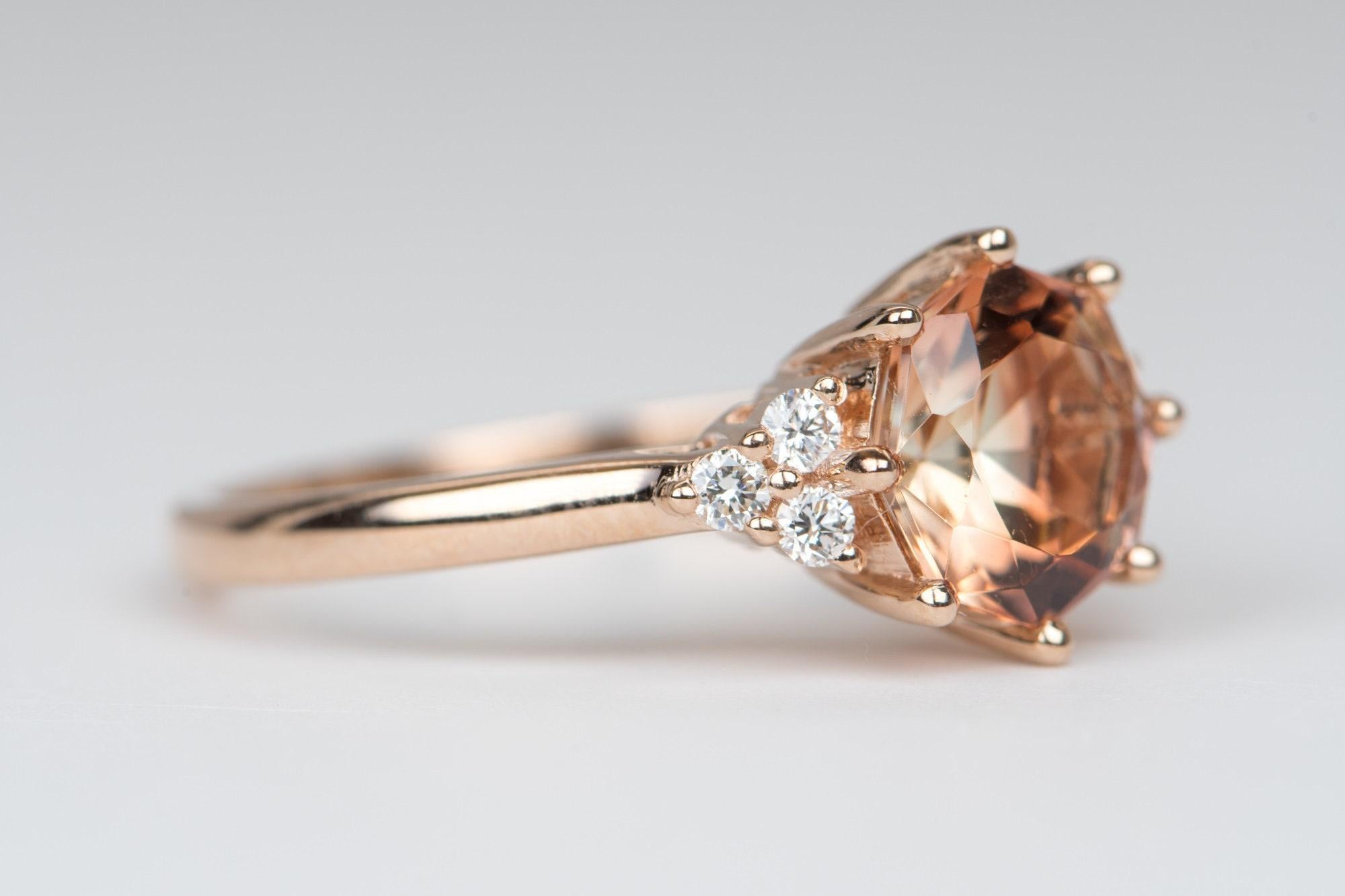 ♥  Solid 14K rose gold ring set with an orange octagon Oregon sunstone center, flanked with a trio of diamonds on each side. 
♥  The overall setting measures 15.09mm wide, 9.8mm in length, and sits 6.8mm tall from the finger

♥  Ring size: US Size 7