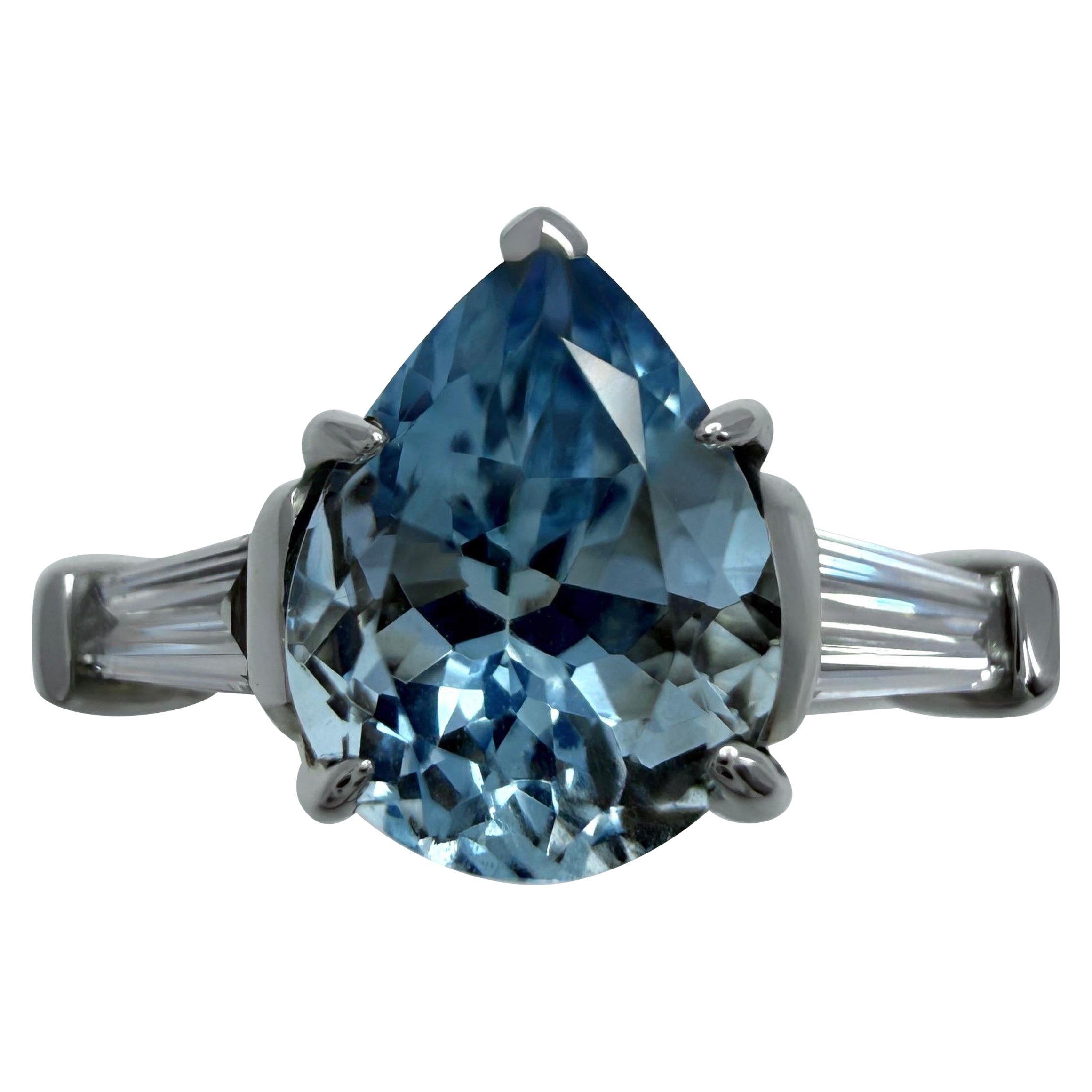 1.64ct Pear Cut Aquamarine And Baguette Cut Diamond Platinum Three Stone Ring For Sale