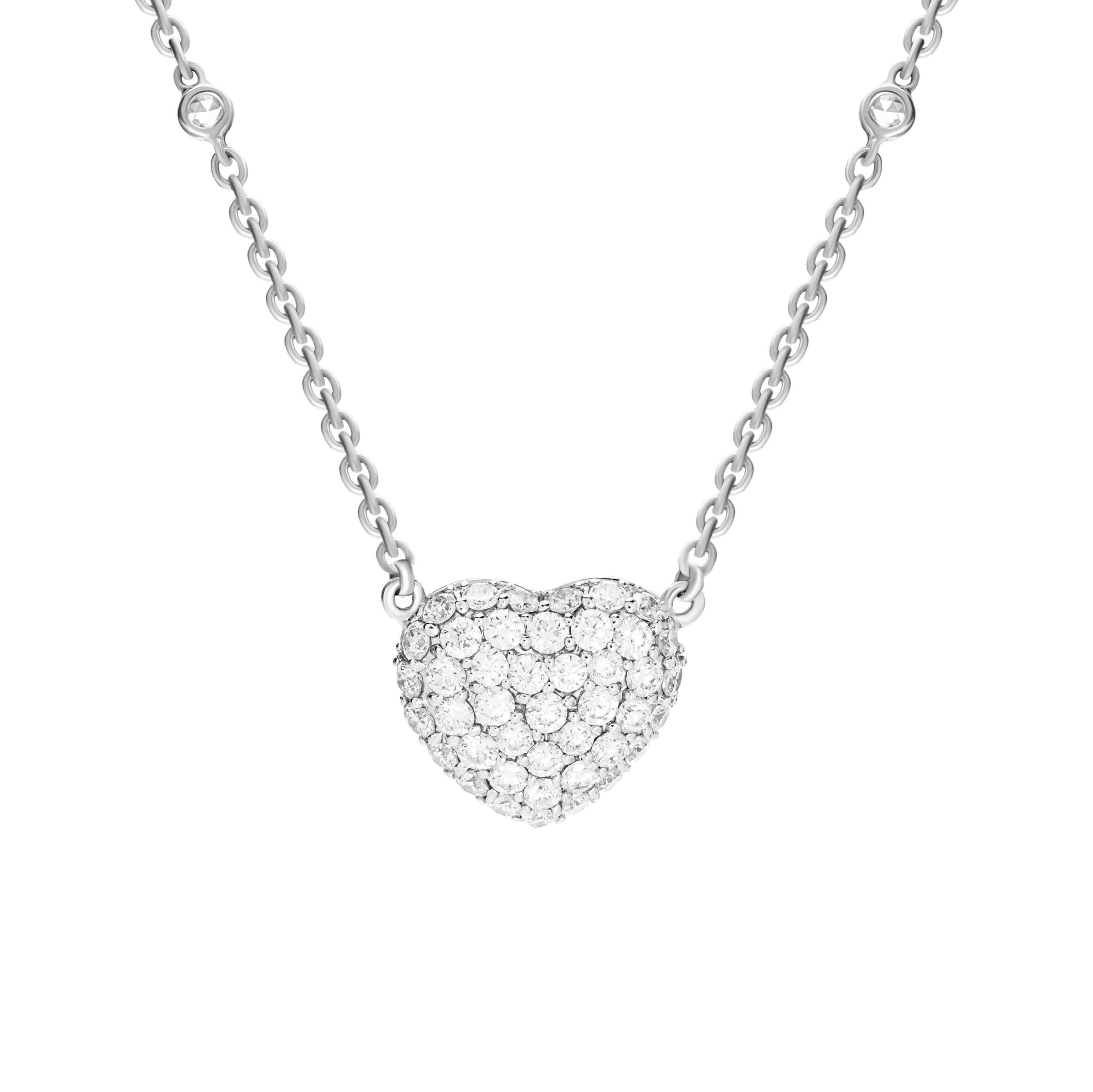 Sparkling pavé-set diamonds (totaling 1.65 carats) bring a bright shine to this 18-karat white gold necklace.  Symbolic of your beautiful love story, the round diamonds completely fill a sweet and puffy heart.  Surprise her with this romantic