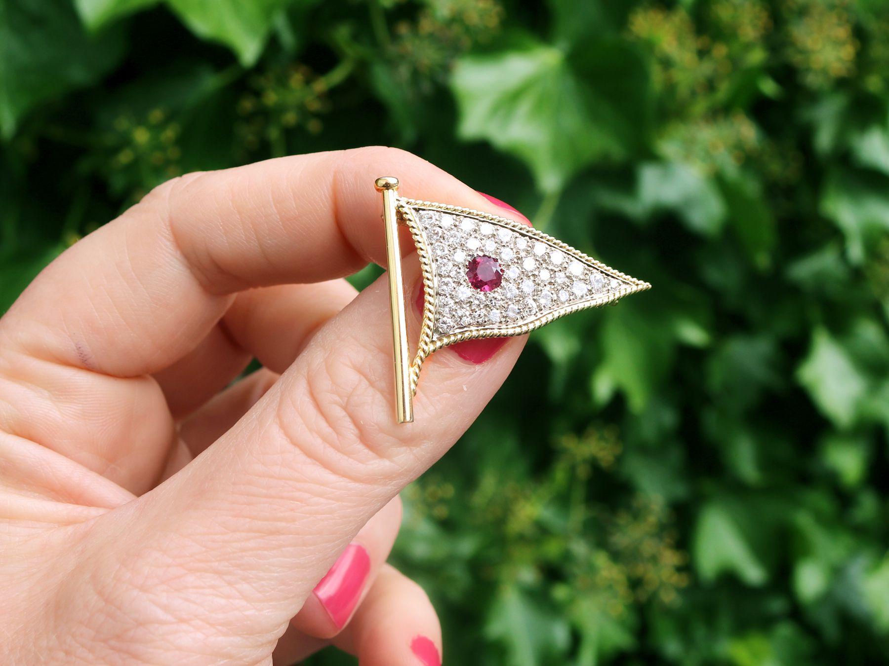 A stunning, fine and impressive vintage 1.65 carat diamond and 0.48 carat ruby, 18 karat yellow gold and 18k white gold set flag brooch; part of our diverse diamond jewellery and estate jewelry collections.

This stunning vintage brooch has been