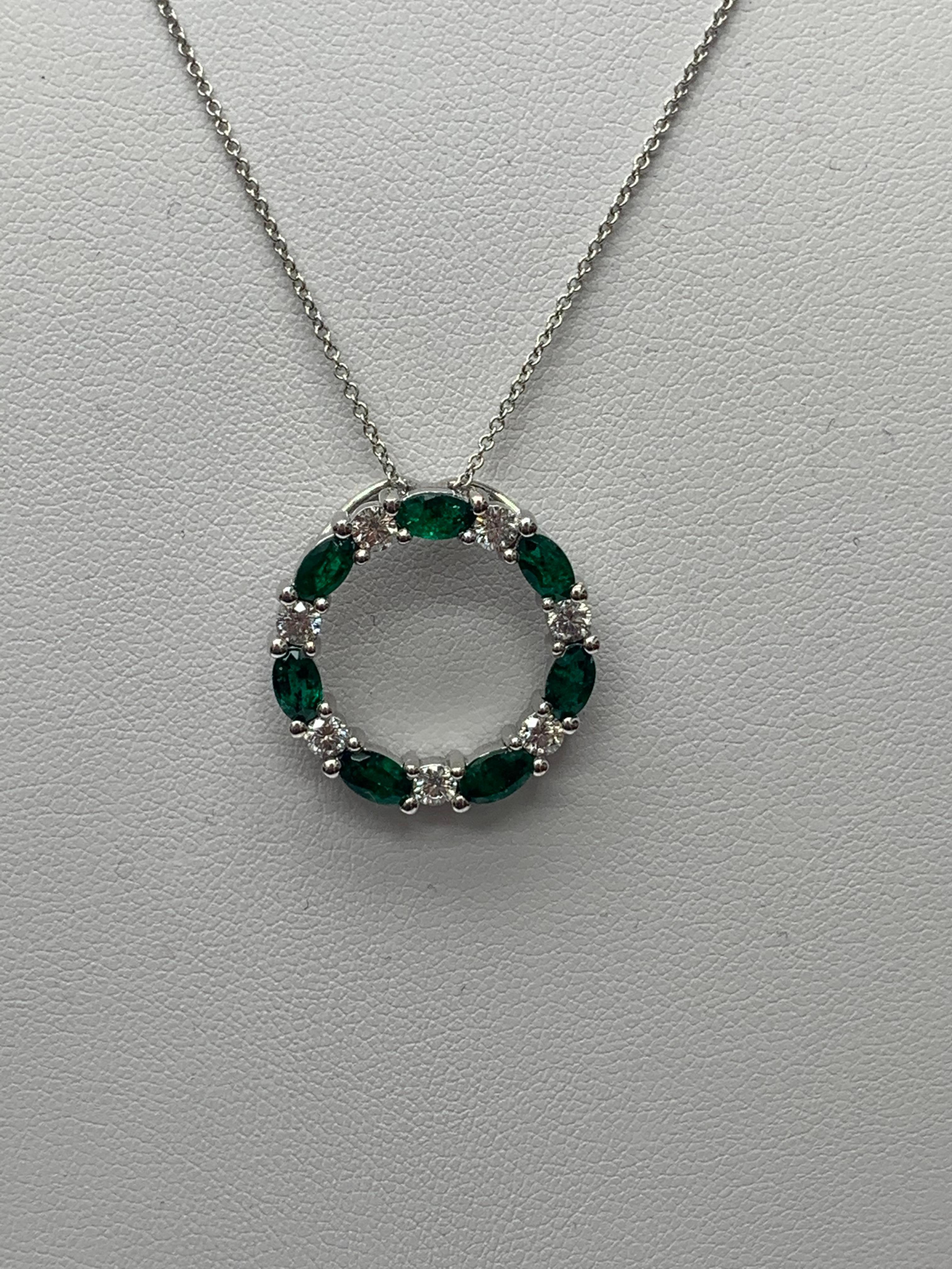 Modern 1.65 Carat Emerald and Diamond Circle Pendant Necklace in 14k White Gold For Sale