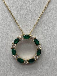 1.65 Carat Emerald and Diamond Circle Pendant Necklace in 14k Yellow Gold