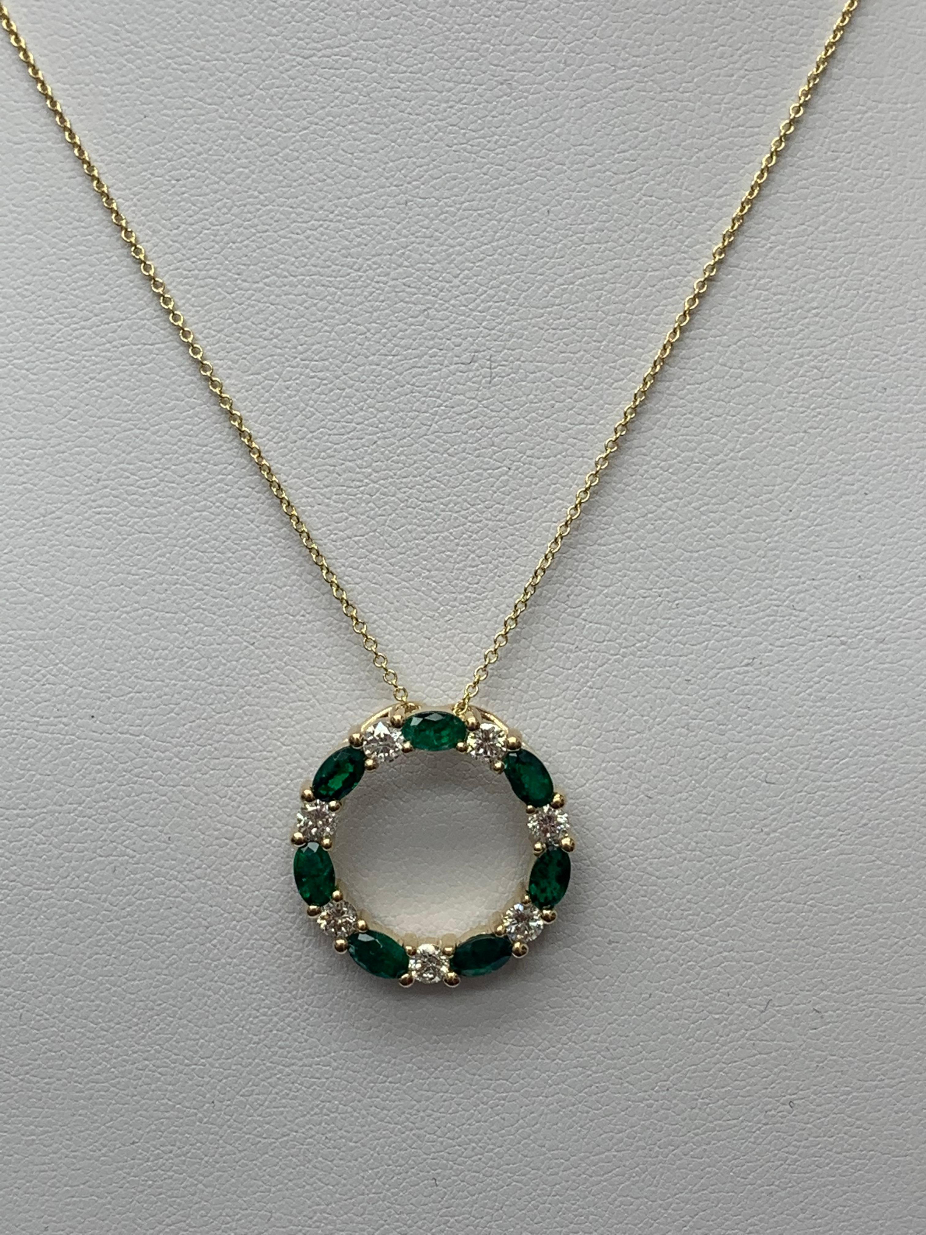 Modern 1.65 Carat Emerald and Diamond Circle Pendant Necklace in 14k Yellow Gold For Sale