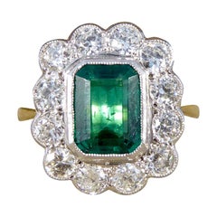 1.65 Carat Emerald and Diamond Cluster Ring in 18 Carat White and Yellow Gold