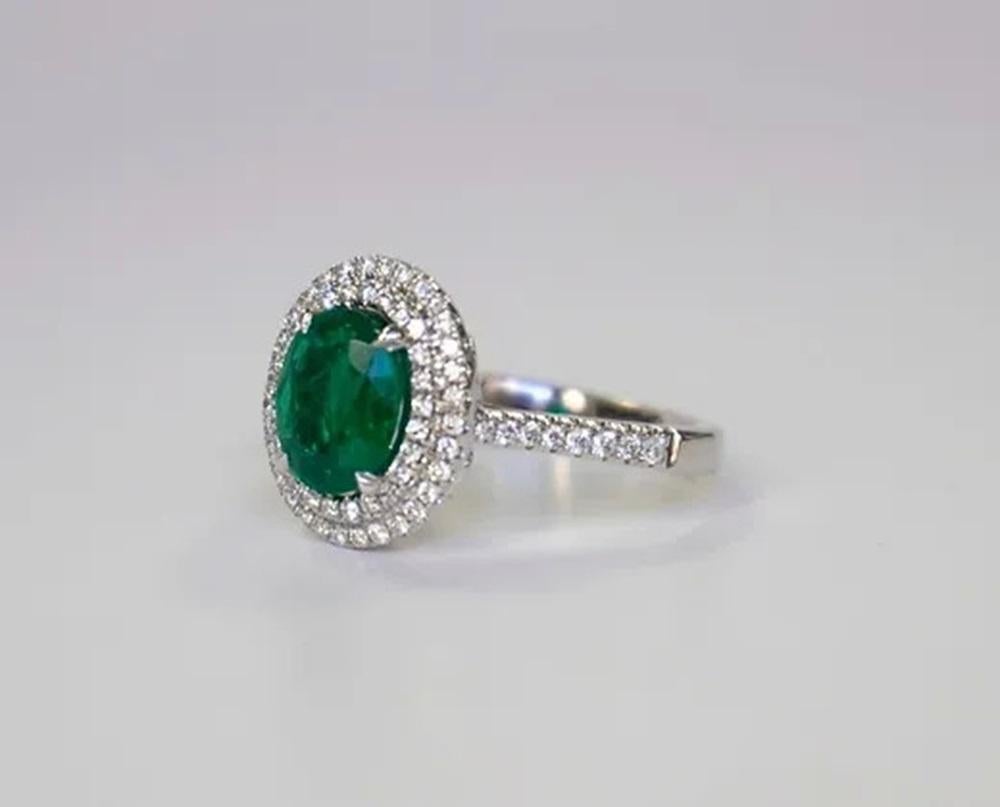 Oval Cut 1.65 Carat Emerald Double Halo Ring For Sale