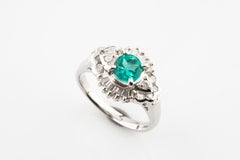 1.65 Carat Emerald Solitaire Platinum Ring with Diamond Accents
