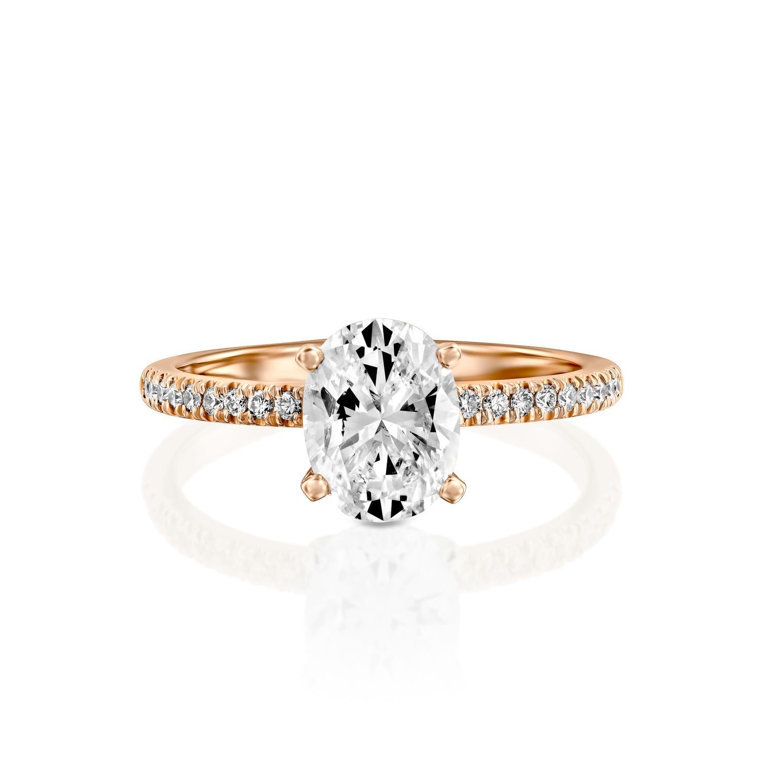 Exquisitely hand crafted ring features a solitaire GIA certified diamond. Ring features a 1.5 carat oval cut 100% eye clean natural diamond of F-G color and VS2-SI1 clarity and it is accented by diamonds of approx. 0.15 total carat weight. Set in a