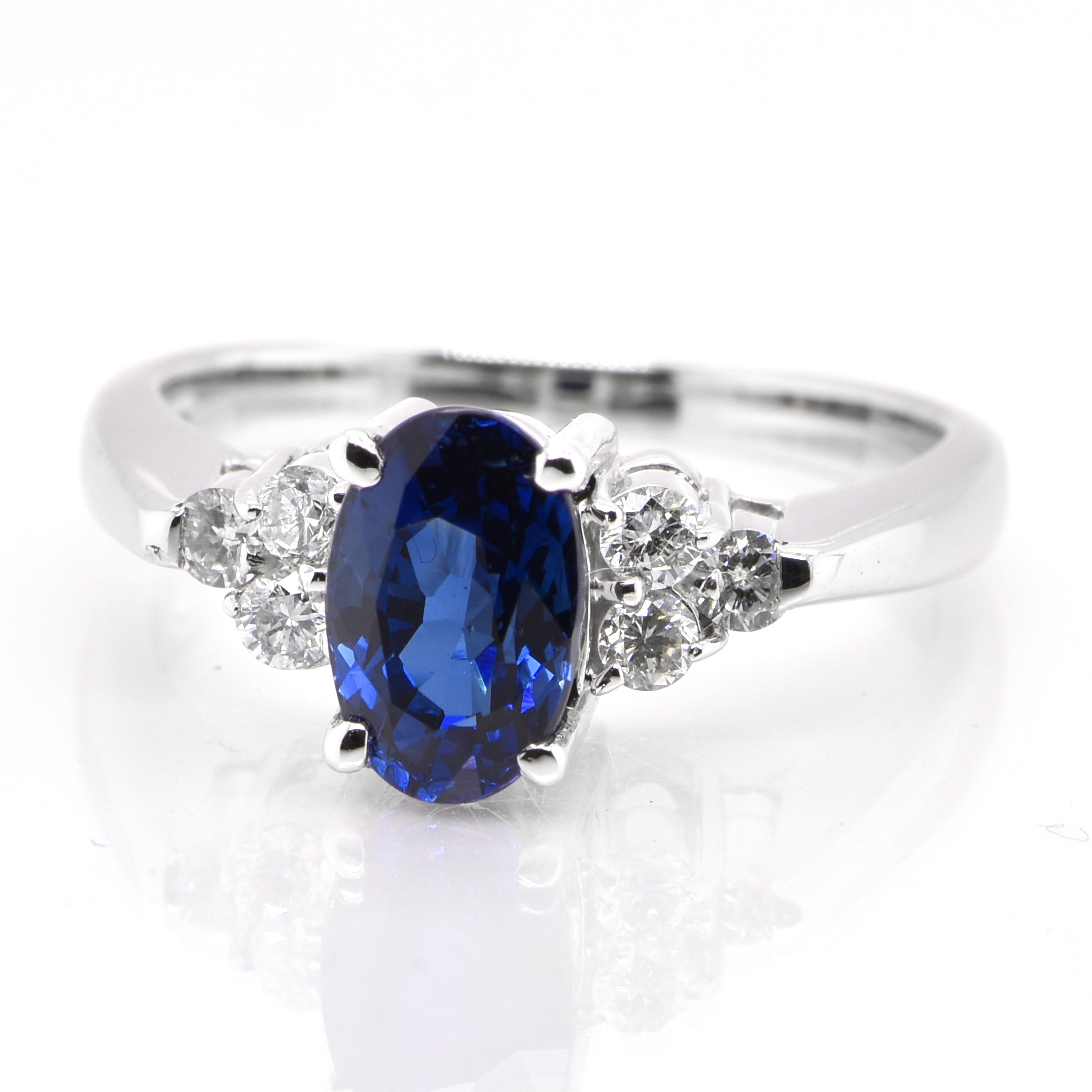 A beautiful ring featuring 1.65 Carat Natural Blue Sapphire and 0.24 Carats Diamond Accents set in Platinum. Sapphires have extraordinary durability - they excel in hardness as well as toughness and durability making them very popular in jewelry.