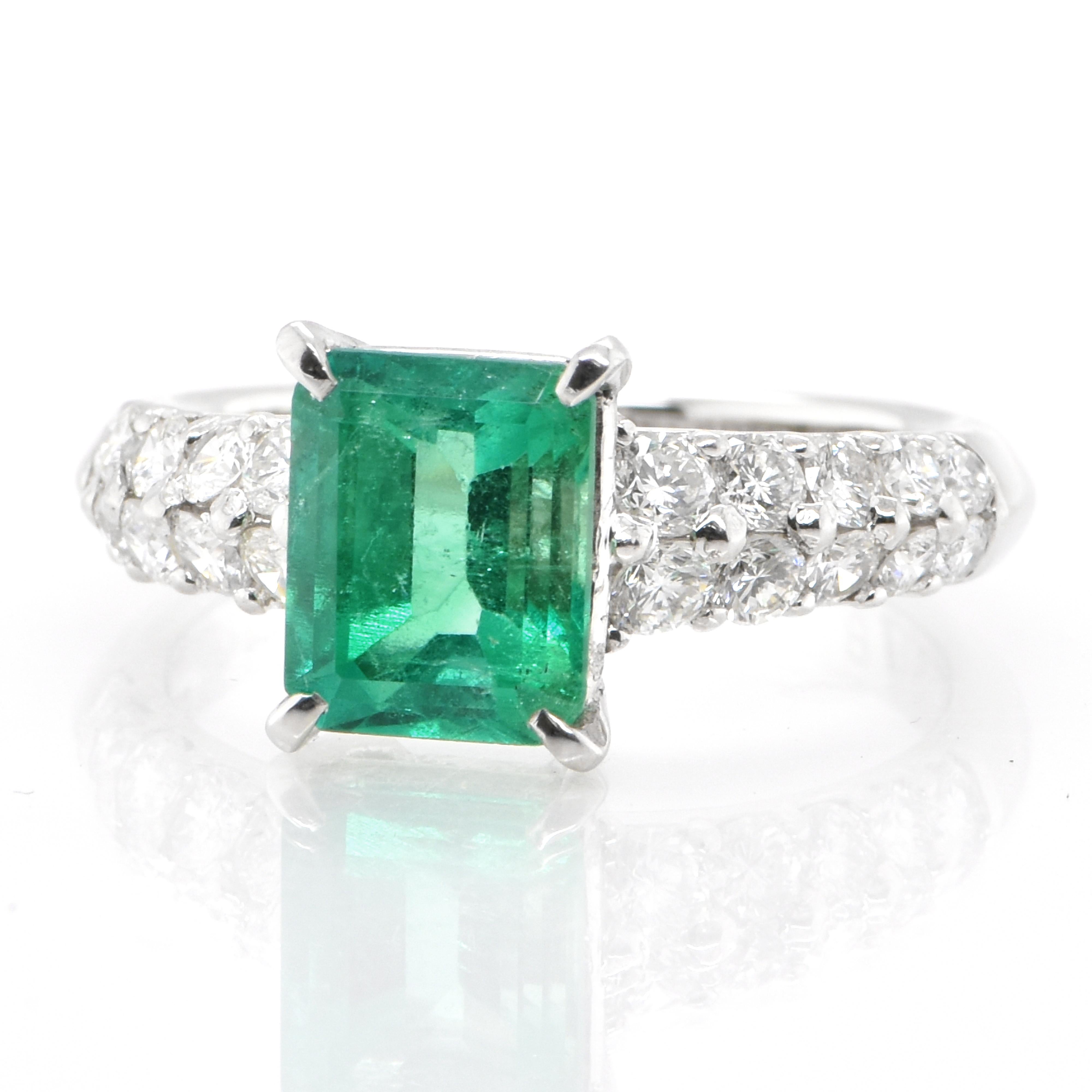 A stunning ring featuring a 1.65 Carat Natural Emerald and 0.78 Carats of Diamond Accents set in Platinum. People have admired emerald’s green for thousands of years. Emeralds have always been associated with the lushest landscapes and the richest