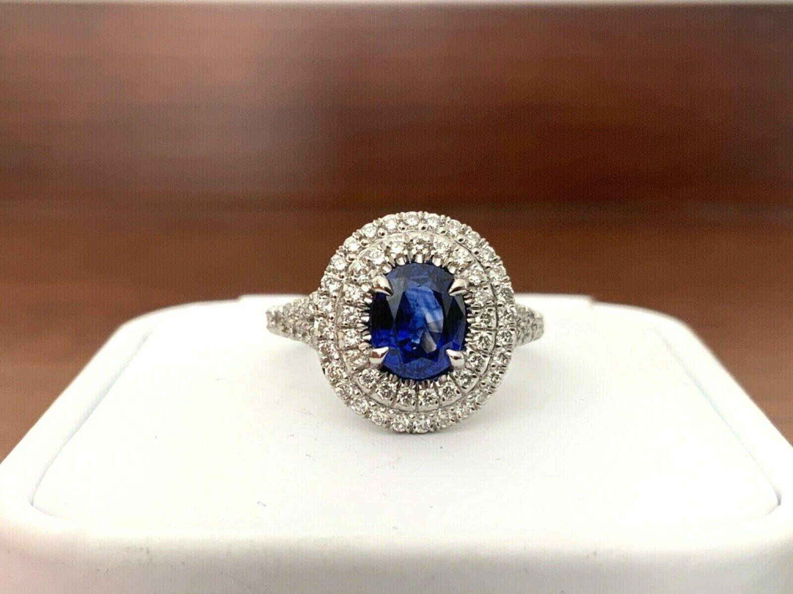 Oval Cut 1.65 Carat Natural Royal Blue Madagascar Sapphire and Diamond Ring GIA Certified For Sale