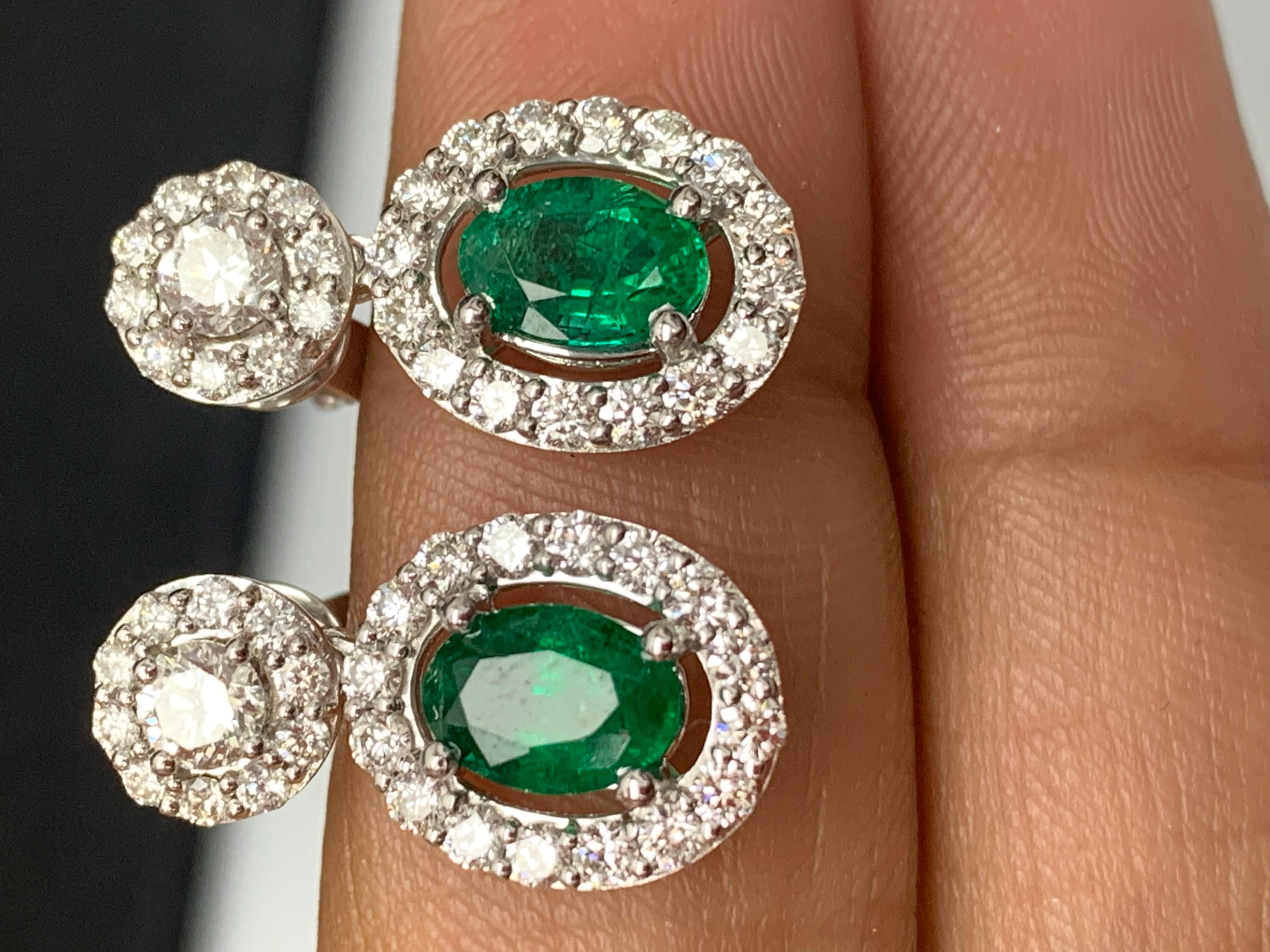 Contemporary 1.65 Carat of Oval cut Emerald and Diamond Drop Earrings in 18K White Gold For Sale