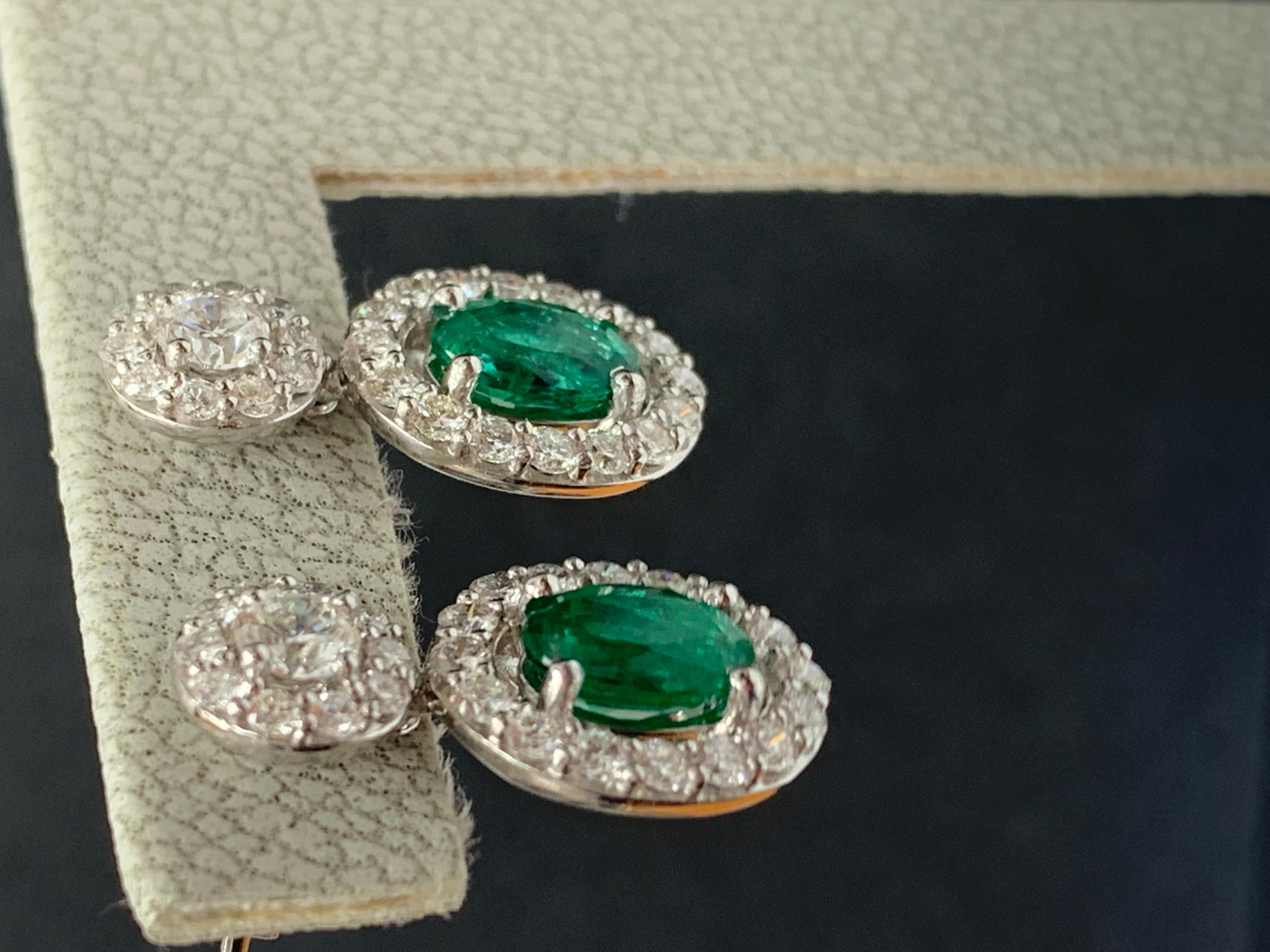 1.65 Carat of Oval cut Emerald and Diamond Drop Earrings in 18K White Gold In New Condition For Sale In NEW YORK, NY