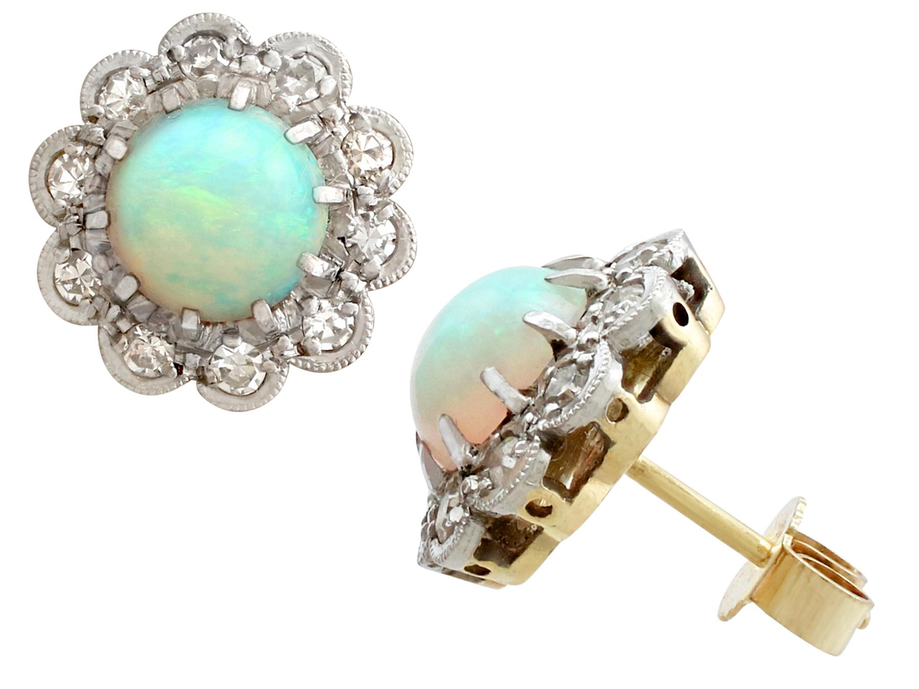 An impressive pair of antique 1.65 carat opal and 0.32 carat diamond, 18 carat yellow and white gold stud earrings; part of our diverse antique jewellery collections.

These fine and impressive opal earrings have been crafted in 18ct yellow gold