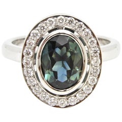 1.65 Carat Oval Cut Teal Blue Sapphire and Diamond Engagement Ring