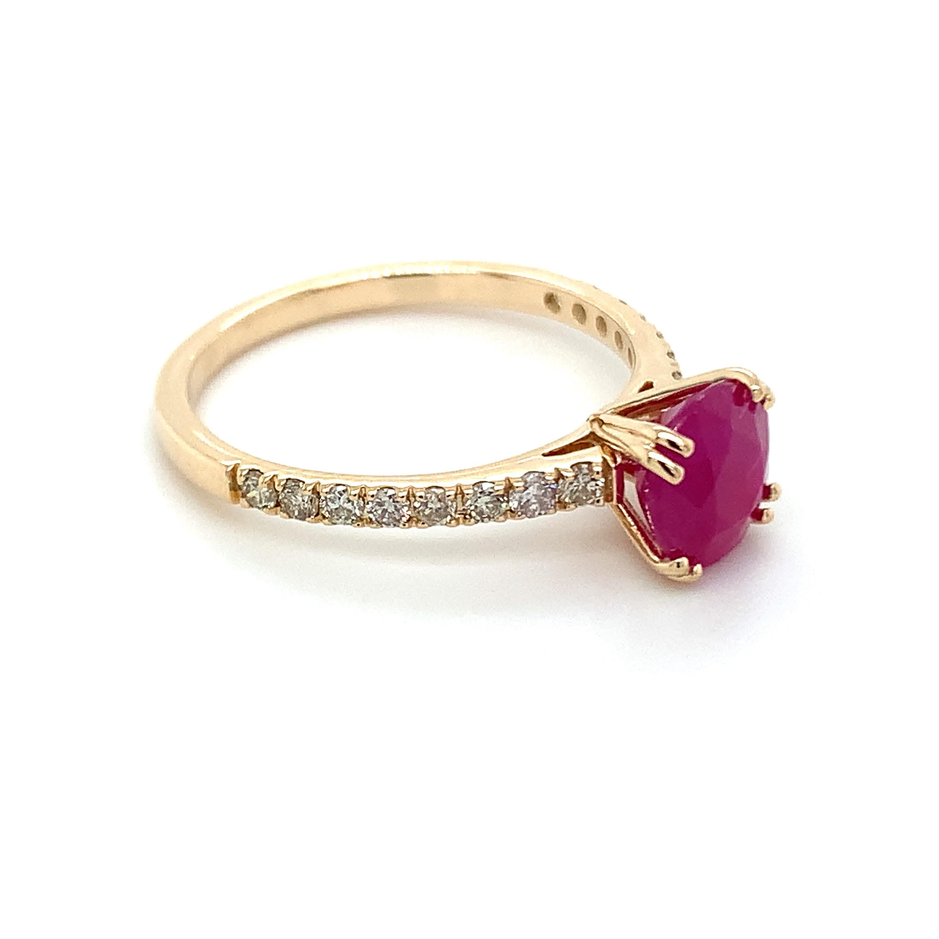 Round shape Ruby gemstone beautifully crafted in a 10K yellow gold ring with natural diamonds.

An exquisite red color birthstone for July. Believed to convey a status of power & wealth. Explore a vast range of precious stone Jewelry in our store.