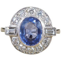 1.65 Carat Sapphire and Diamond Cluster Engagement Ring mounted in Platinum