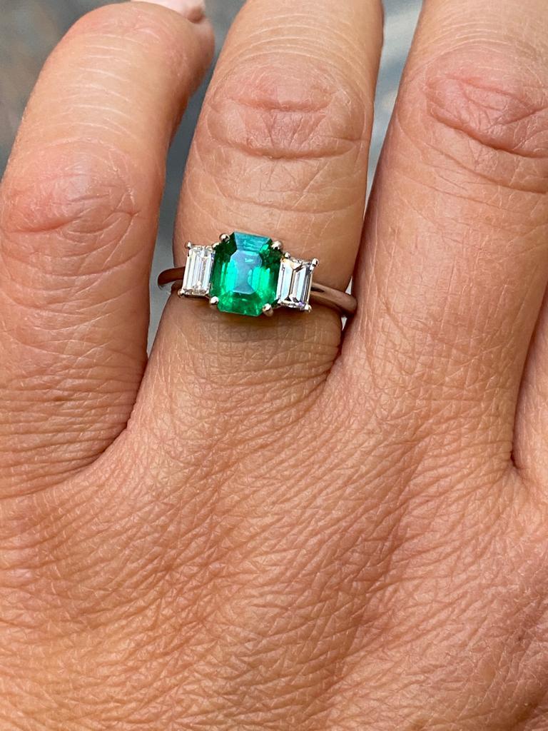 Emerald Cut 1.65 Carat Zambian Emerald and Diamond Three Stone Platinum Engagement Ring For Sale