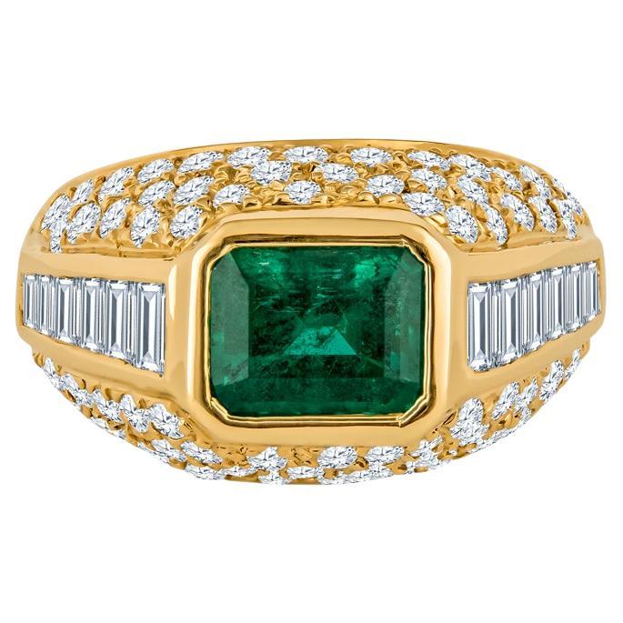 1.65 Carat Zambian Emerald Bezel Set 18 Karat Yellow Gold Cocktail Ring For Sale