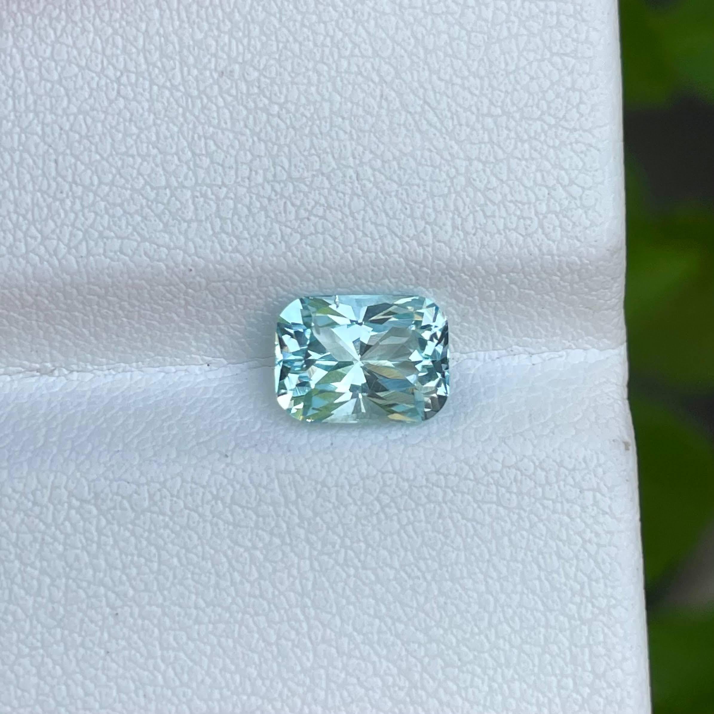 Weight 1.65 carats 
Dimensions 8.3x6.12x4.92 mm
Treatment none 
Origin Nigeria 
Clarity VVS
Shape cushion
Cut custom precision 





This exquisite gemstone boasts a captivating 1.65 carat Aquamarine of unparalleled quality, sourced from the rich