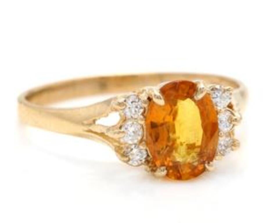 1.65 Carats Exquisite Natural Orange Sapphire and Diamond 14K Solid Yellow Gold Ring

Total Natural Yellow Sapphire Weights: Approx. 1.50 Carats

Sapphire Measures: Approx. 8.00 x 5.80mm

Natural Round Diamonds Weight: 0.15 Carats (color H / Clarity