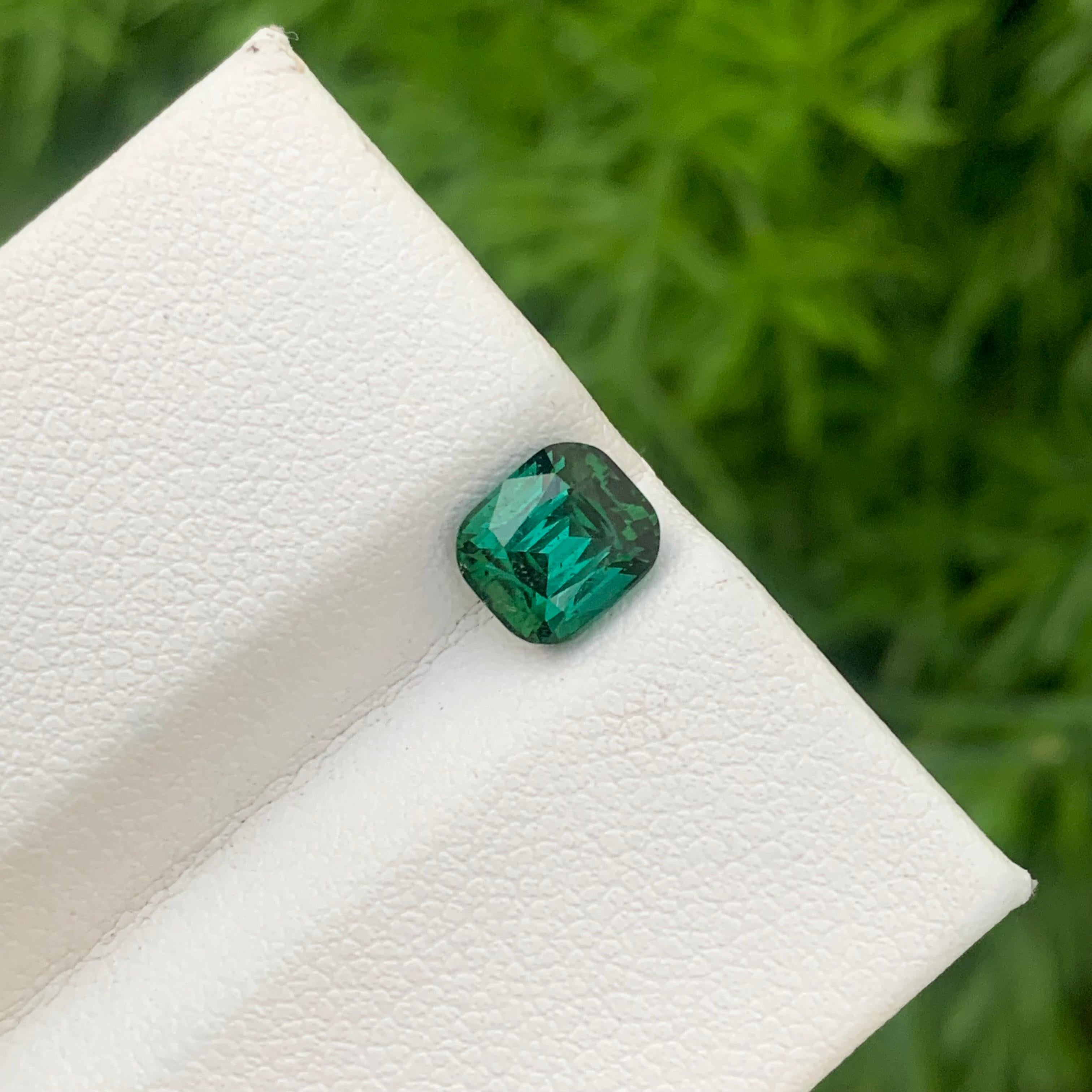 Faceted Tourmaline 
Weight: 1.65 Carats 
Dimension: 6.9x6x5 Mm
Origin: Afghanistan
Shape: Cushion
Color: Lagoon Green
Treatment: Non/ Natural
Certificate: On Demand
Lagoon green tourmaline, also known simply as lagoon tourmaline, is a captivating