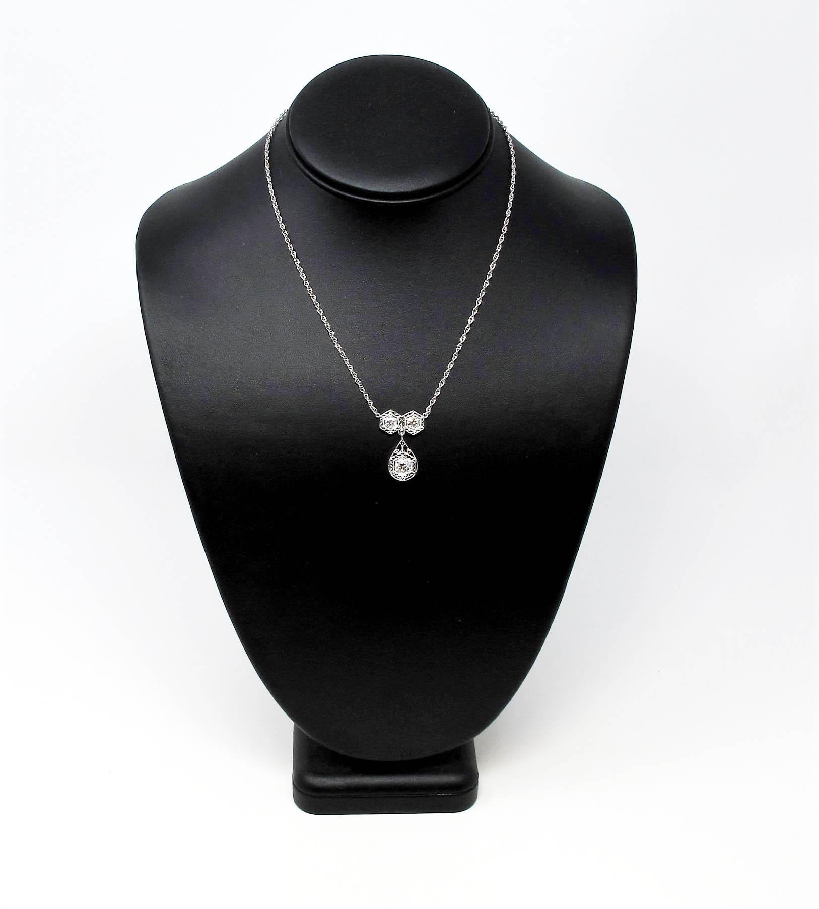 Incredible vintage diamond necklace bursting with Old World charm. This gorgeous piece boasts a simple yet elegant design, elevated by the intricate filigree detailing that really enhance the stunning Old European cut diamonds. This necklace is a