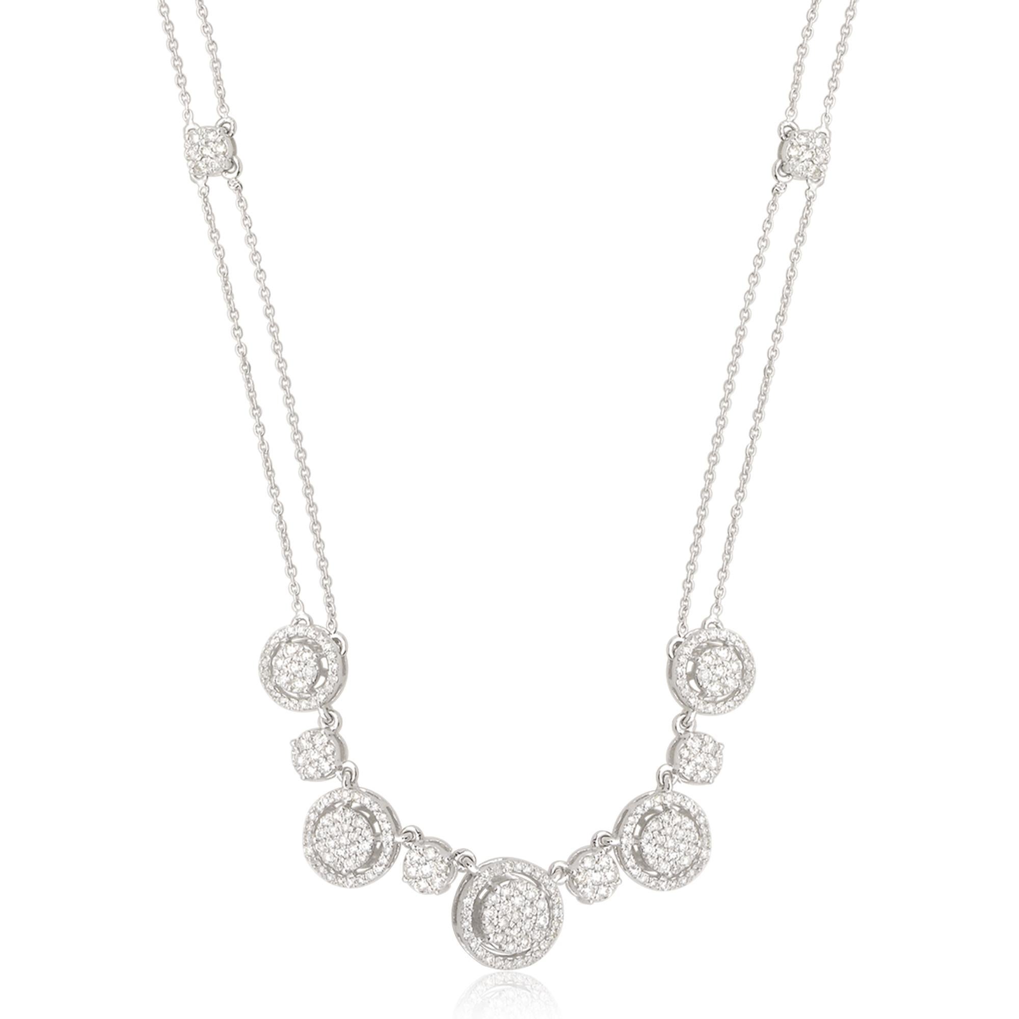 The necklace is designed with versatility in mind. The diamond pendant hangs delicately from a 14 karat white gold chain, which is adjustable to different lengths. This allows for customization, ensuring a comfortable fit and the ability to style