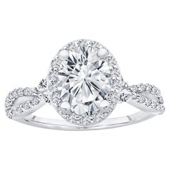 1.65 ct. tw. Halo Design Round Cut Diamond Engagement Ring