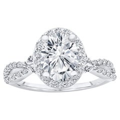 1,65 ct. tw. Verlobungsring mit Halo-Design und Diamant im Rundschliff 