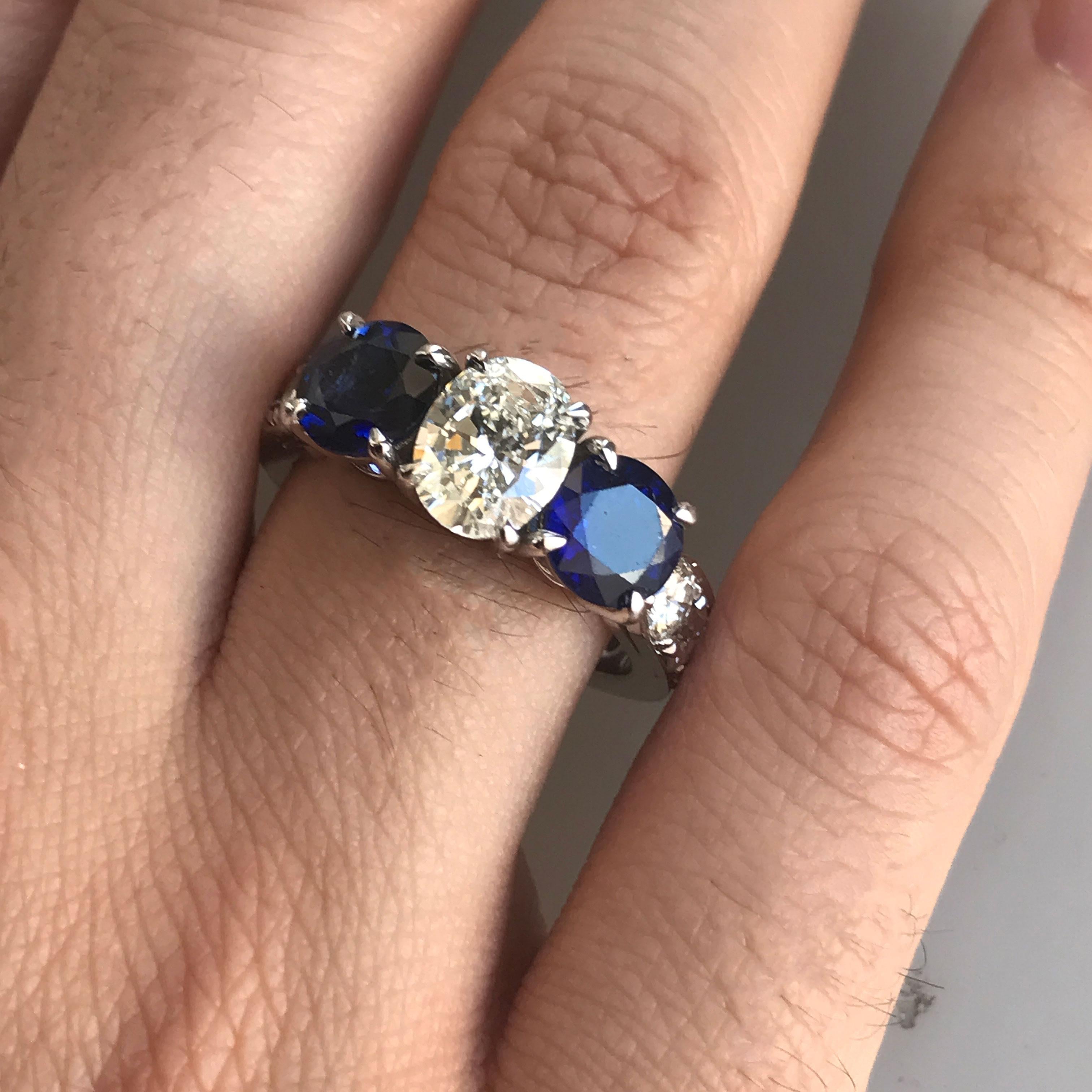 Oval Cut 1.65 CTW Oval Diamond and Blue Sapphire Three Stone Engagement Ring - Ben Dannie For Sale