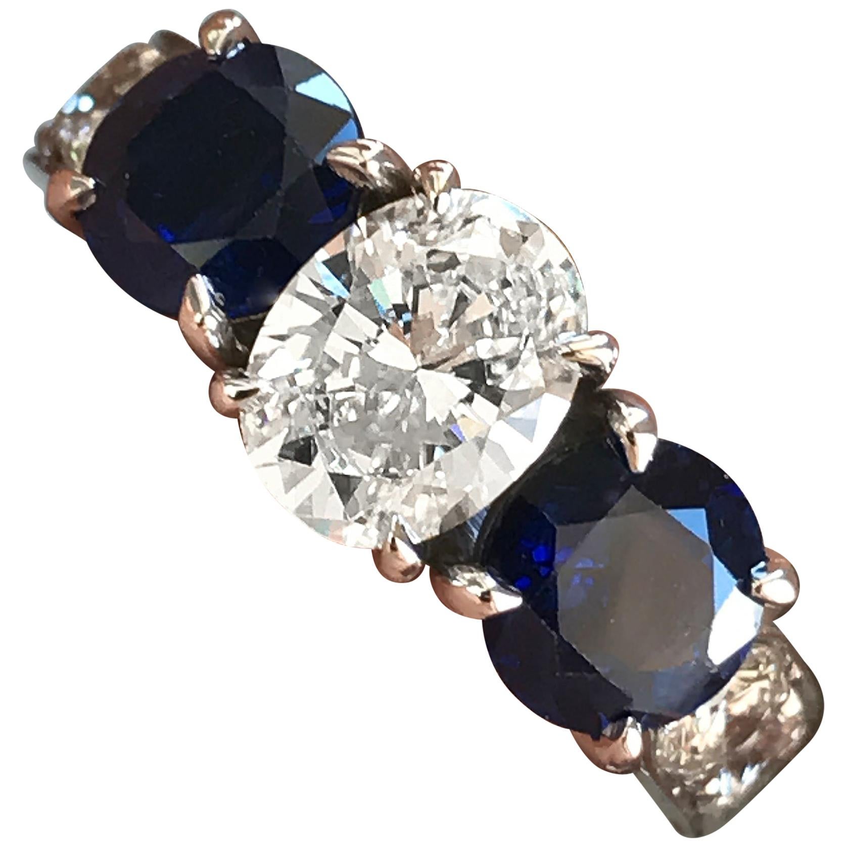 1.65 CTW Oval Diamond and Blue Sapphire Three Stone Engagement Ring - Ben Dannie For Sale
