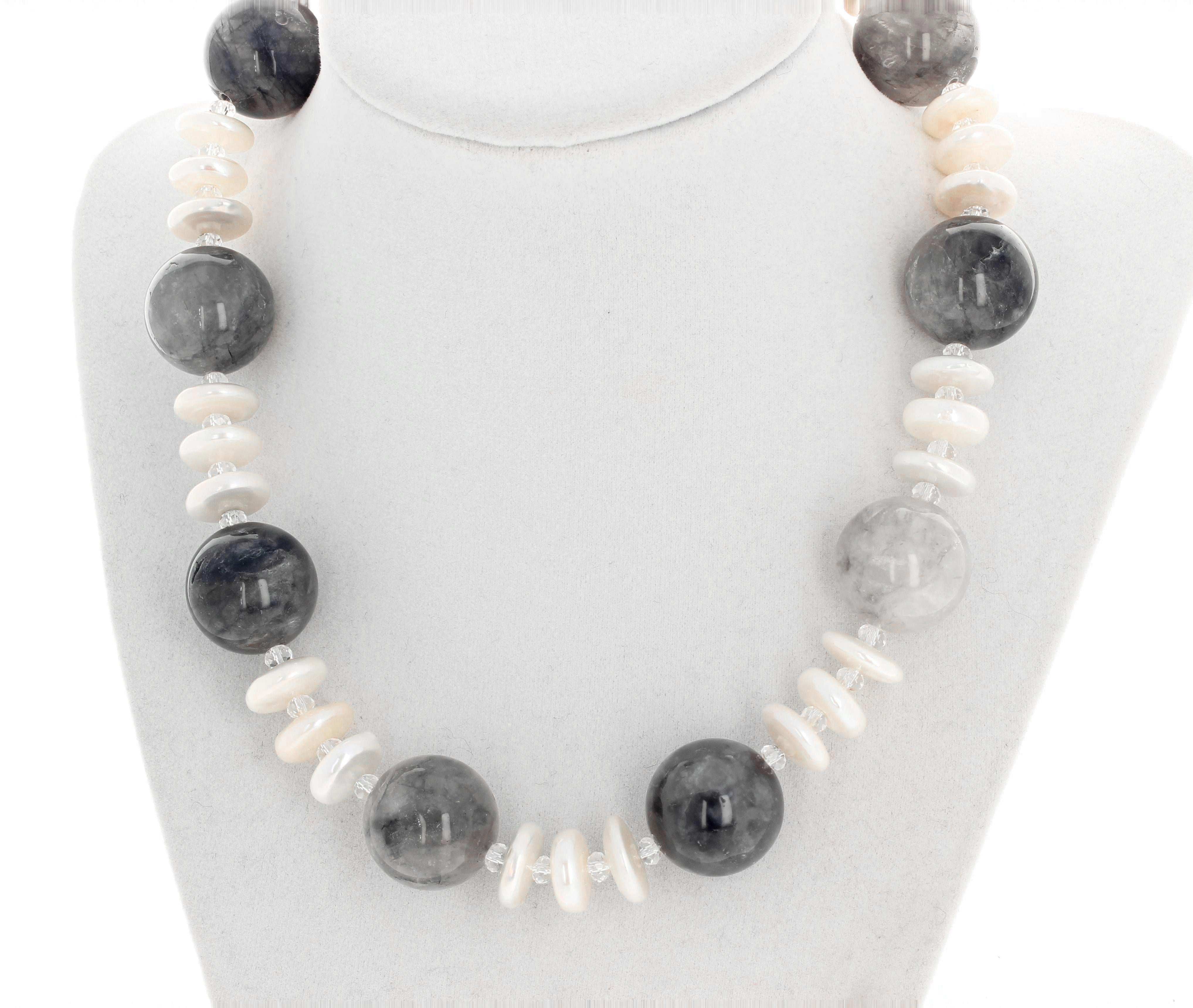 Bright white cultured coin Pearls (13 mm) enhance these lovely round highly polished Smoky Quartz (20 mm) all accented with checkerboard gem cut tiny little sparkling quartz.  The clasp is silver hook/pearl.  This lovely statement necklace is 16.5