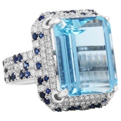Bague en or 18 carats avec aigue-marine taille émeraude, saphir bleu et diamant de 16,50 carats