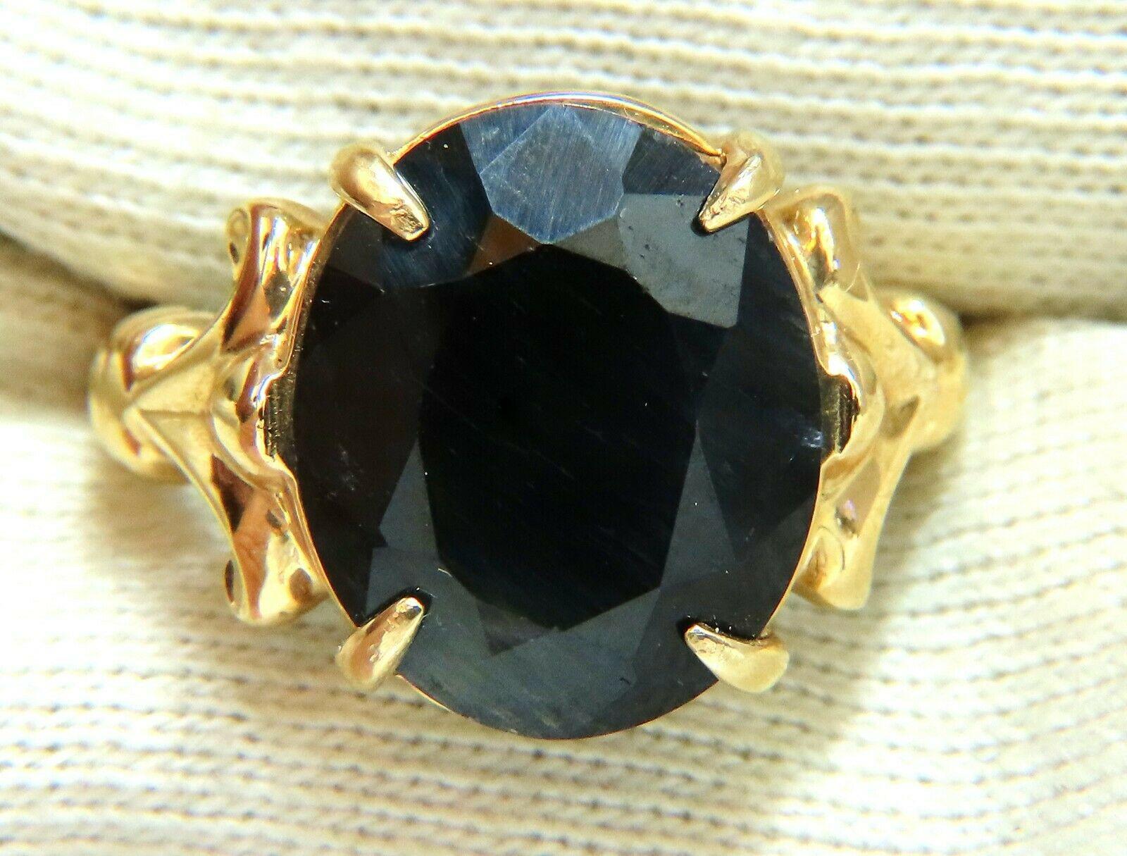 16.50ct. Natural Oval cut Black sapphire ring.

Center Sapphire:

15 X 13mm

14kt Yellow gold.

7.4 grams.

current ring size: 

8.25

can be resized 

please inquire 