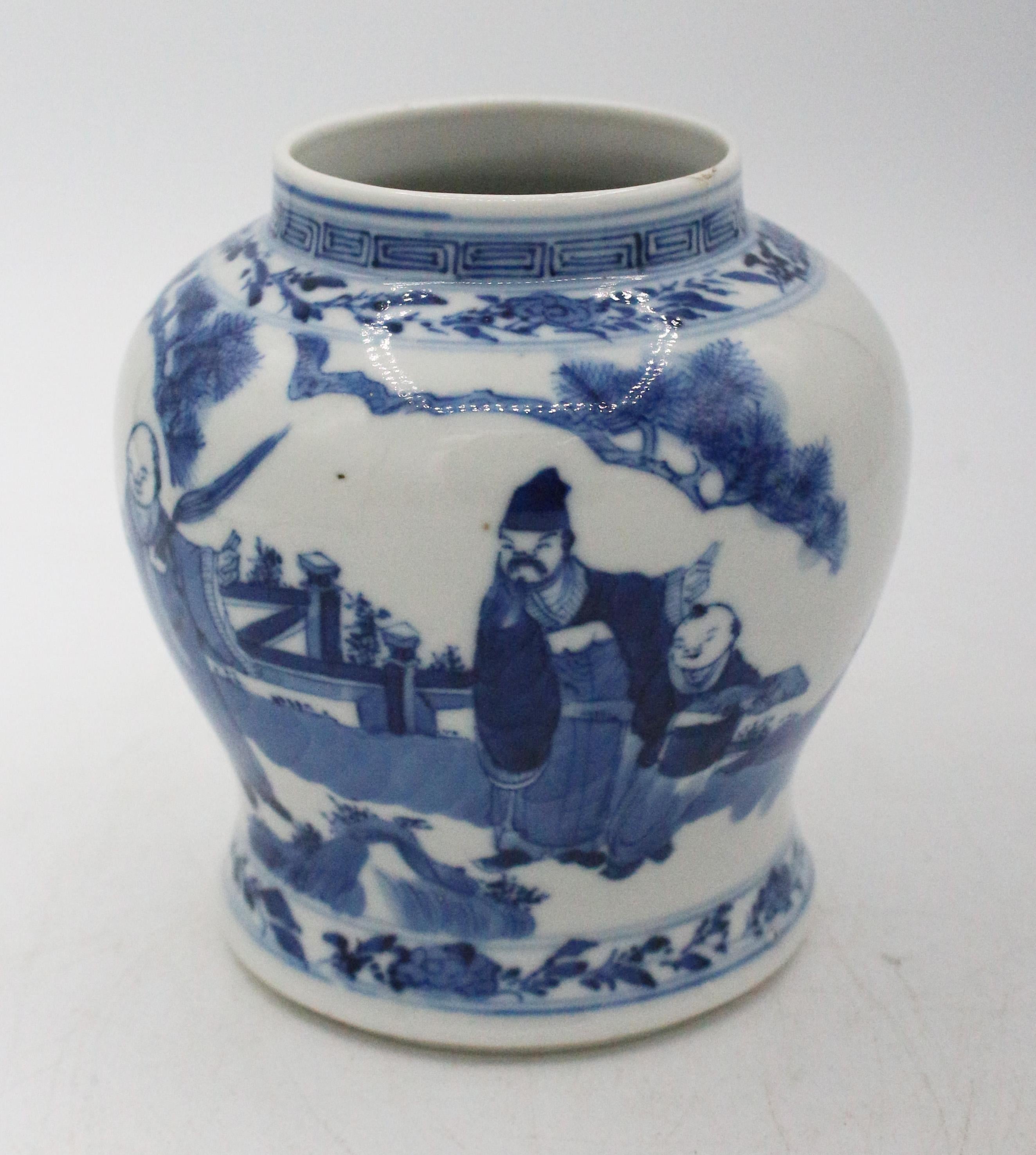 Late 19th century blue & white porcelain small jar, Chinese. Kangxi Revival period with 4 character mark on bottom. Blue underglaze decoration. Elegantly painted with figures under pine trees. Greek key neck. Shoulder of peonies, repeats at base.