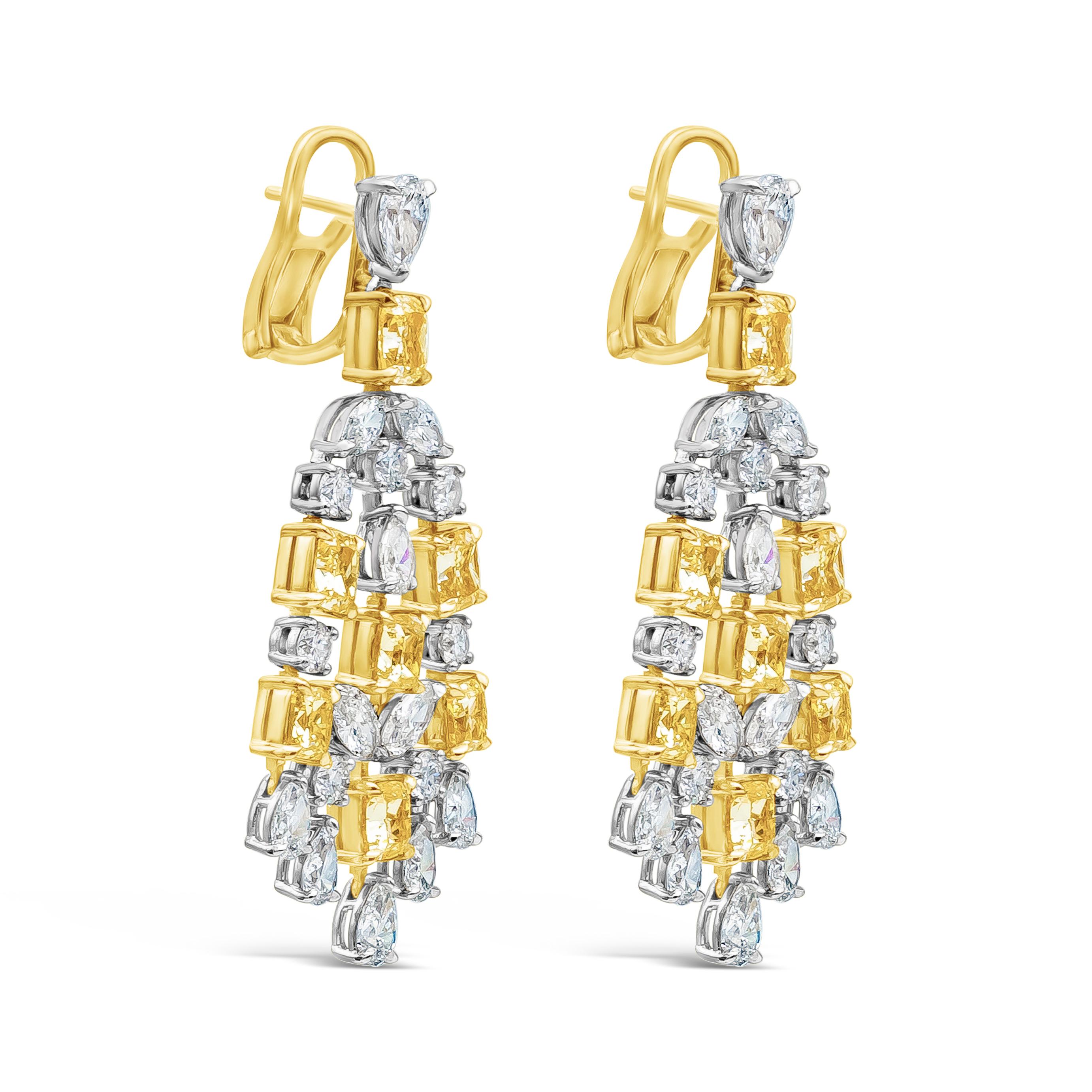 A brilliant piece of high end chandelier earrings, showcasing 14 cushion cut fancy yellow diamonds weighing 9.29 carats total with VS clarity, set on four prong 18K yellow gold. Accented by 36 pieces of mixed cut diamonds weighing 7.27 carats total