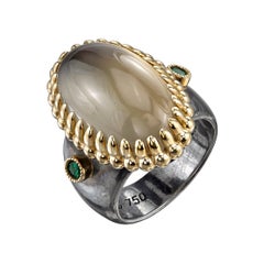 16.57ct Moonstone .25ct TSV 18KY and Organic Silver Ring