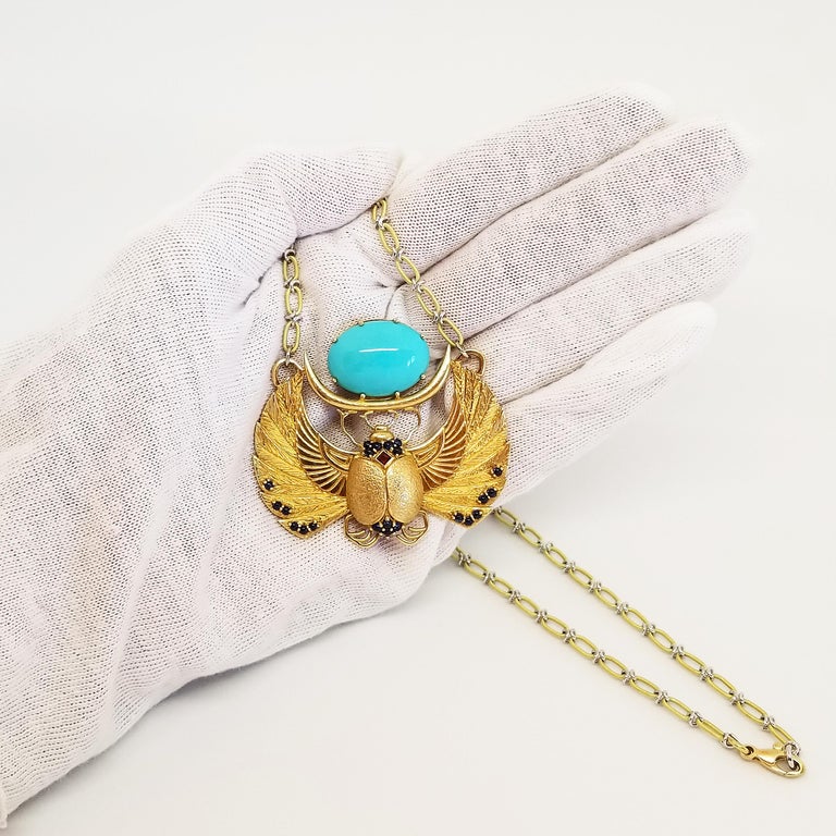 Mixed Cut 16.58 Carat Natural Sleeping Beauty Turquoise 18 Karat Yellow Gold Scarab Neck For Sale